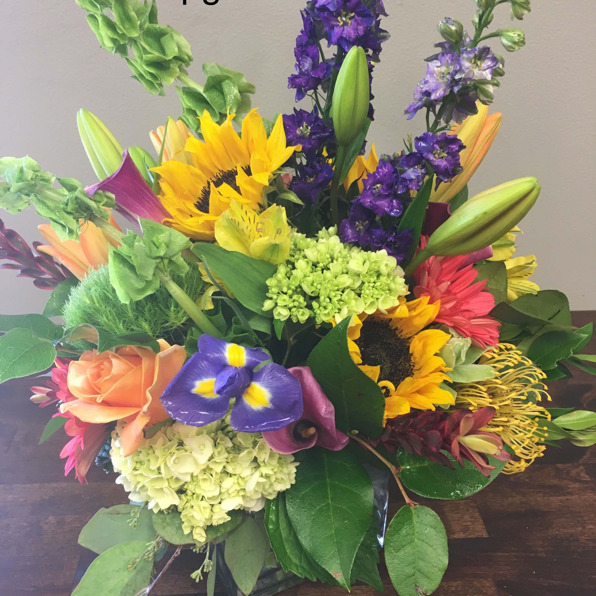 Bright colors shine in the design- orange, yellow, purple and red are