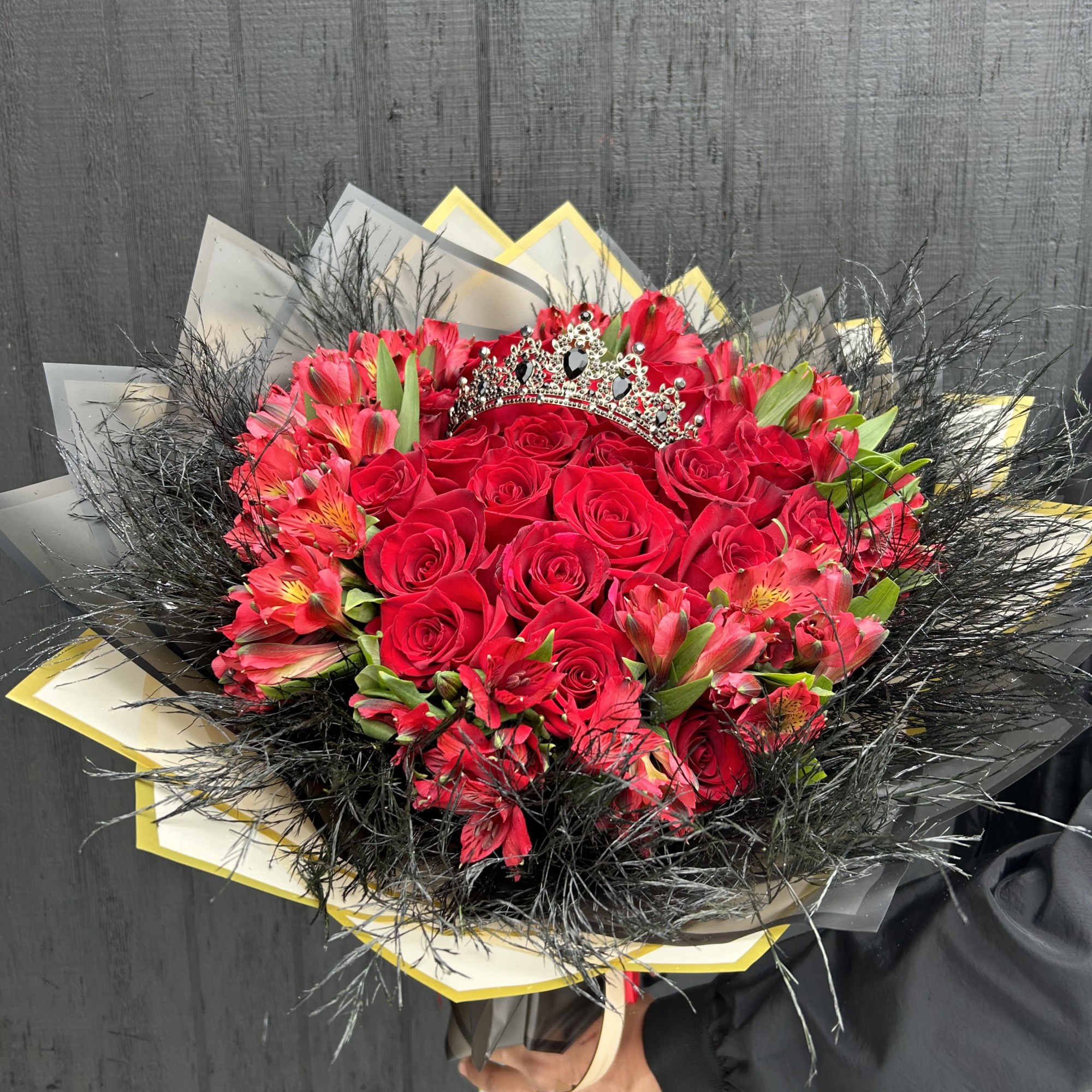 Long stems of red roses with ribbon and wrappers. (available in different