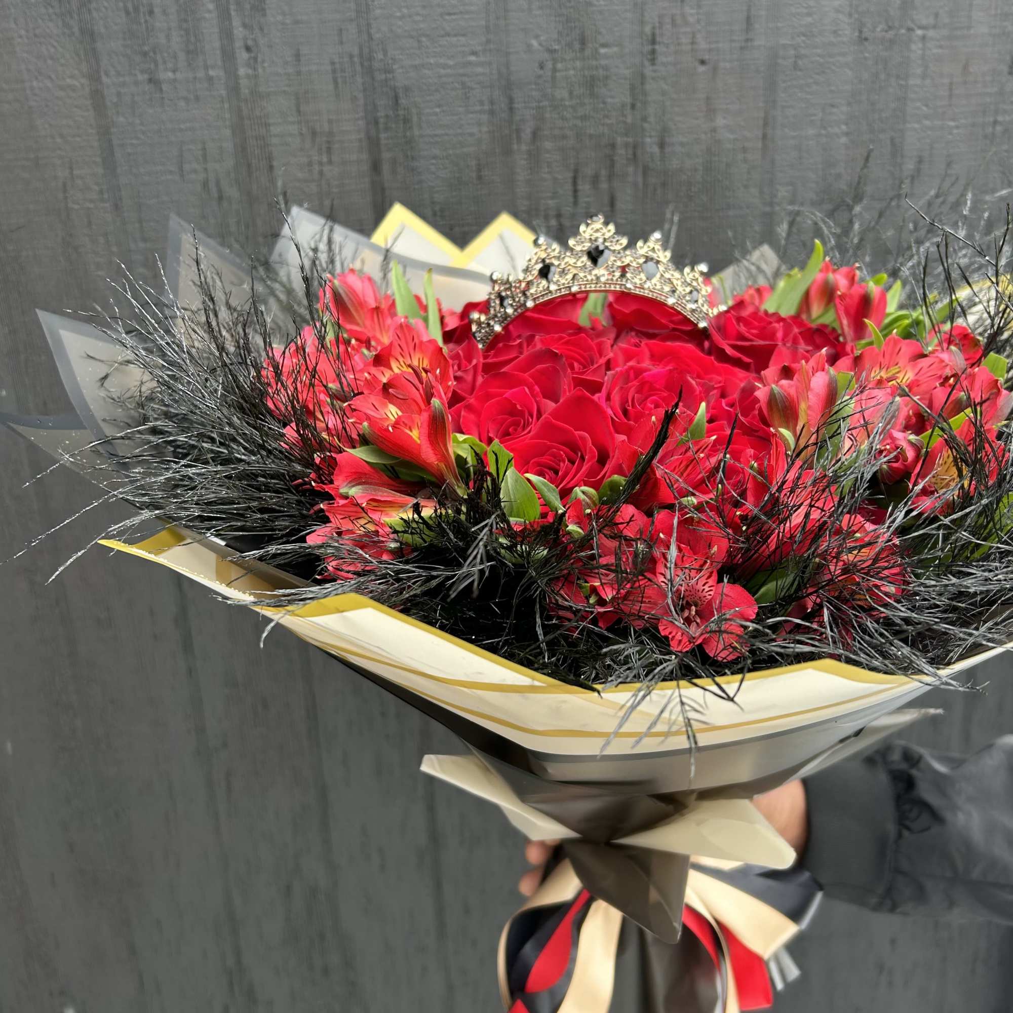 Long stems of red roses with ribbon and wrappers. (available in different