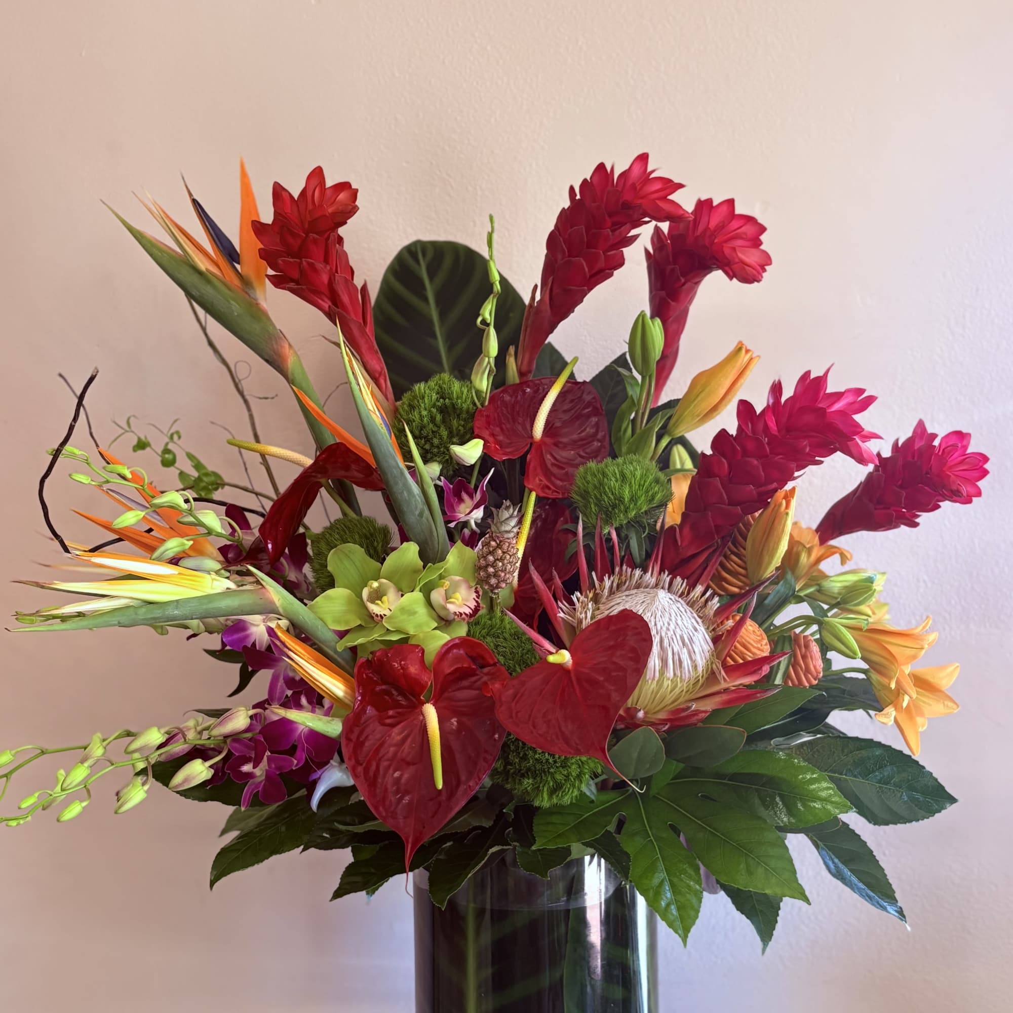 Red Ginger, red anthurium, pink bom dendrobium, birds of paradise, pink king