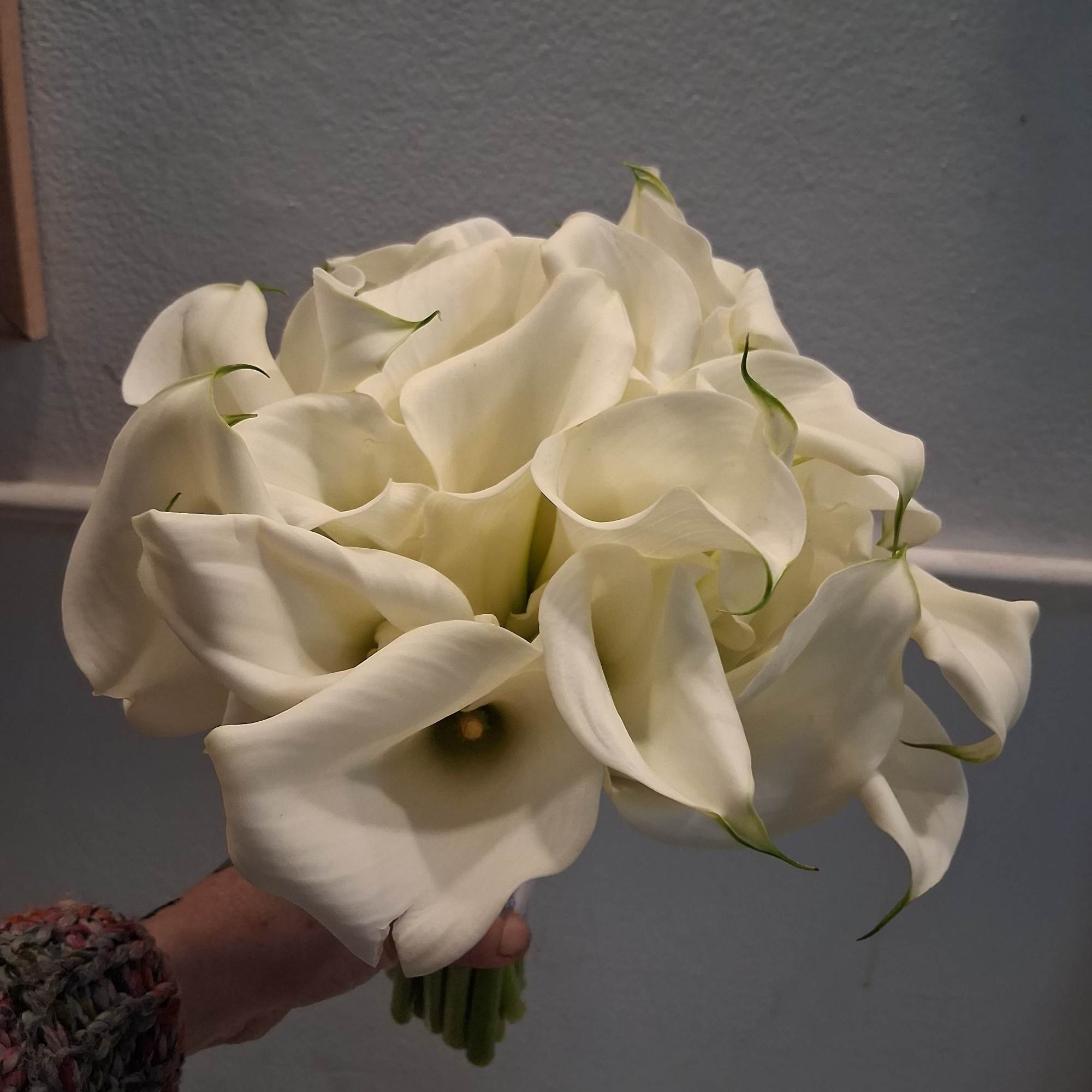 Beautiful stylish calla lilies in one bundle bridal bouquet