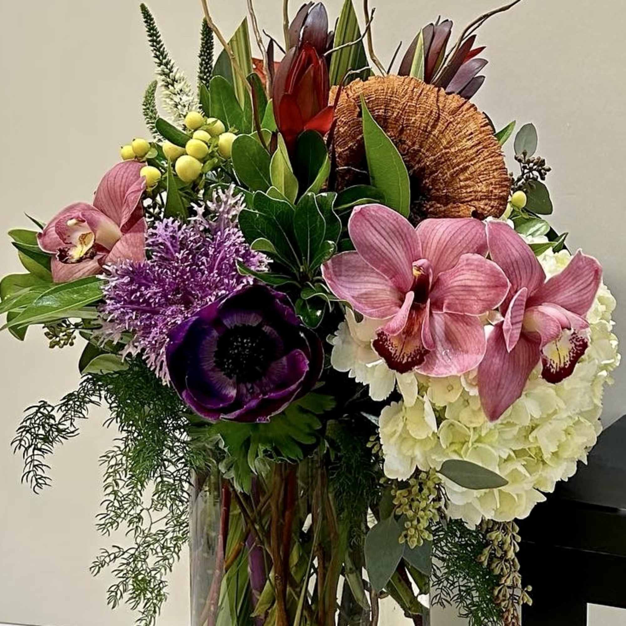 An abundant and colorful floral fantasy consisting of luscious Imported cymbidium orchids An abundant and colorful floral fantasy consisting of luscious Imported cymbidium orchids