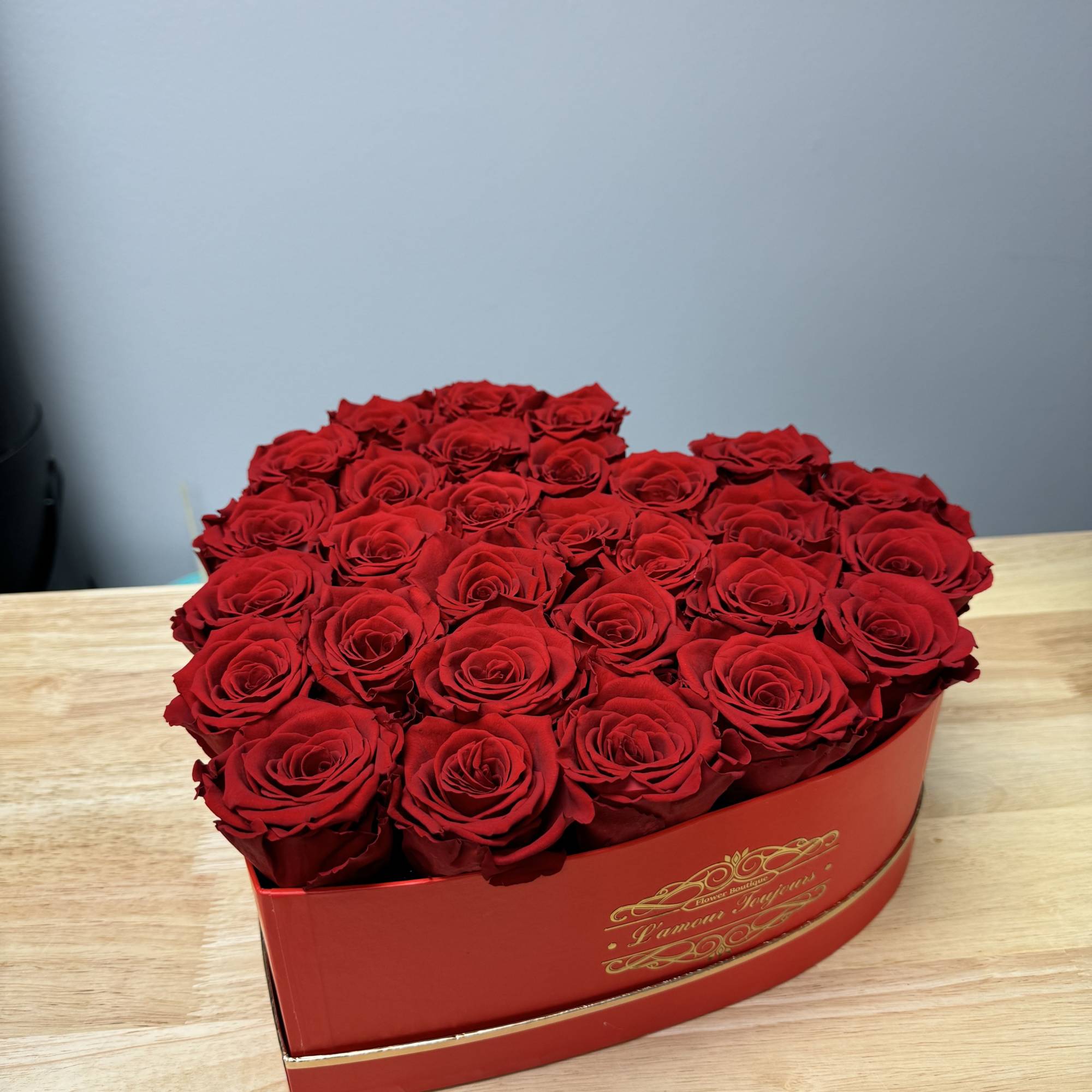 20 Everlasting roses in our signature heart-shaped box. Everlasting roses are real