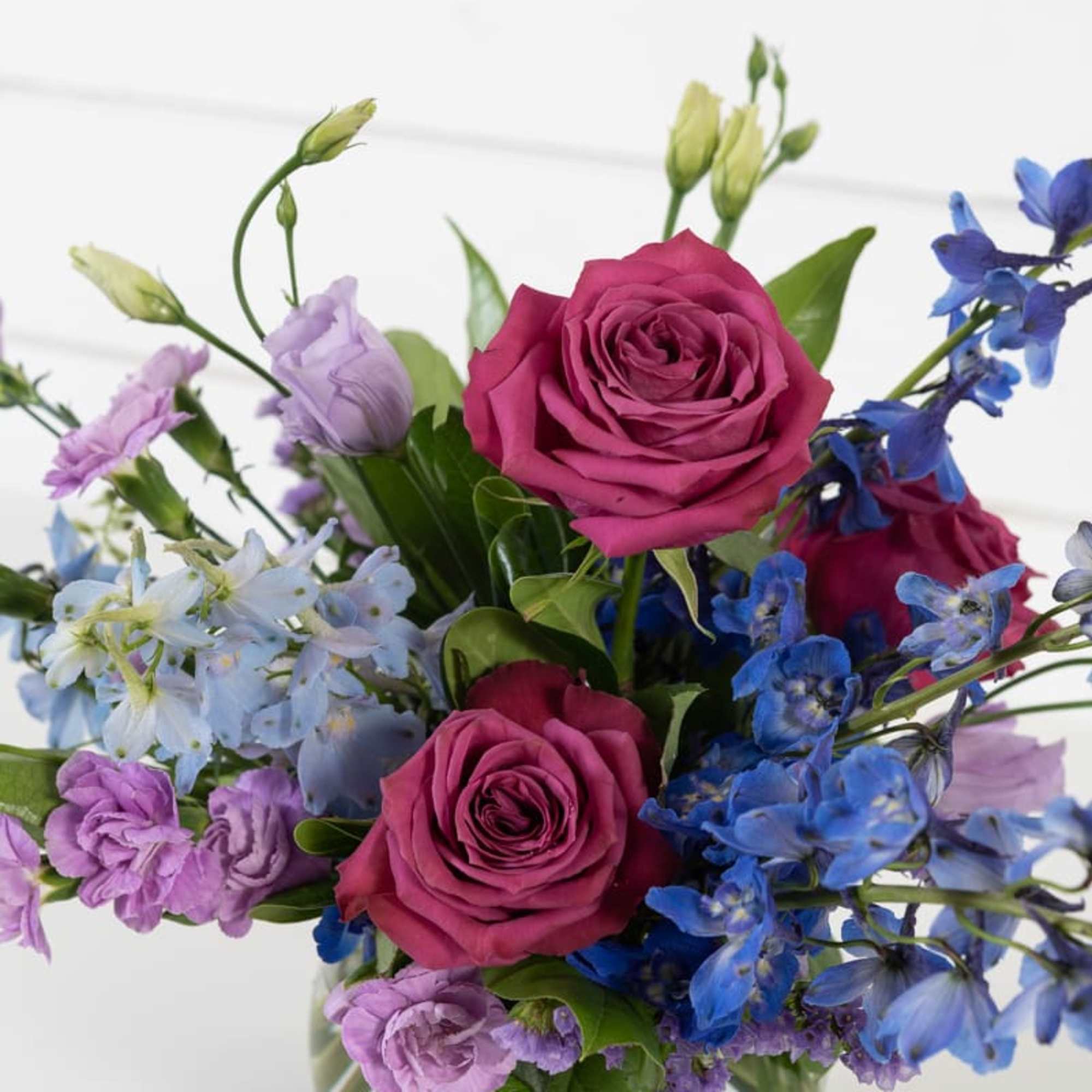 Sweet ombre arrangement in a lush garden mix!