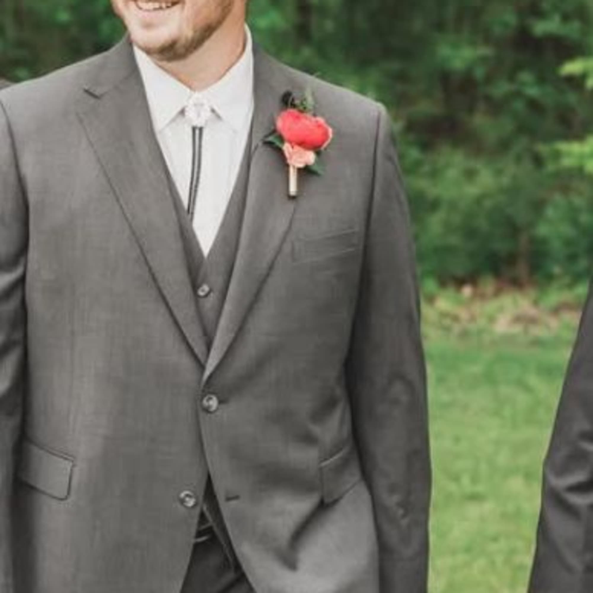 This permanent botanical boutonniere creates a timeless feeling for your special day.