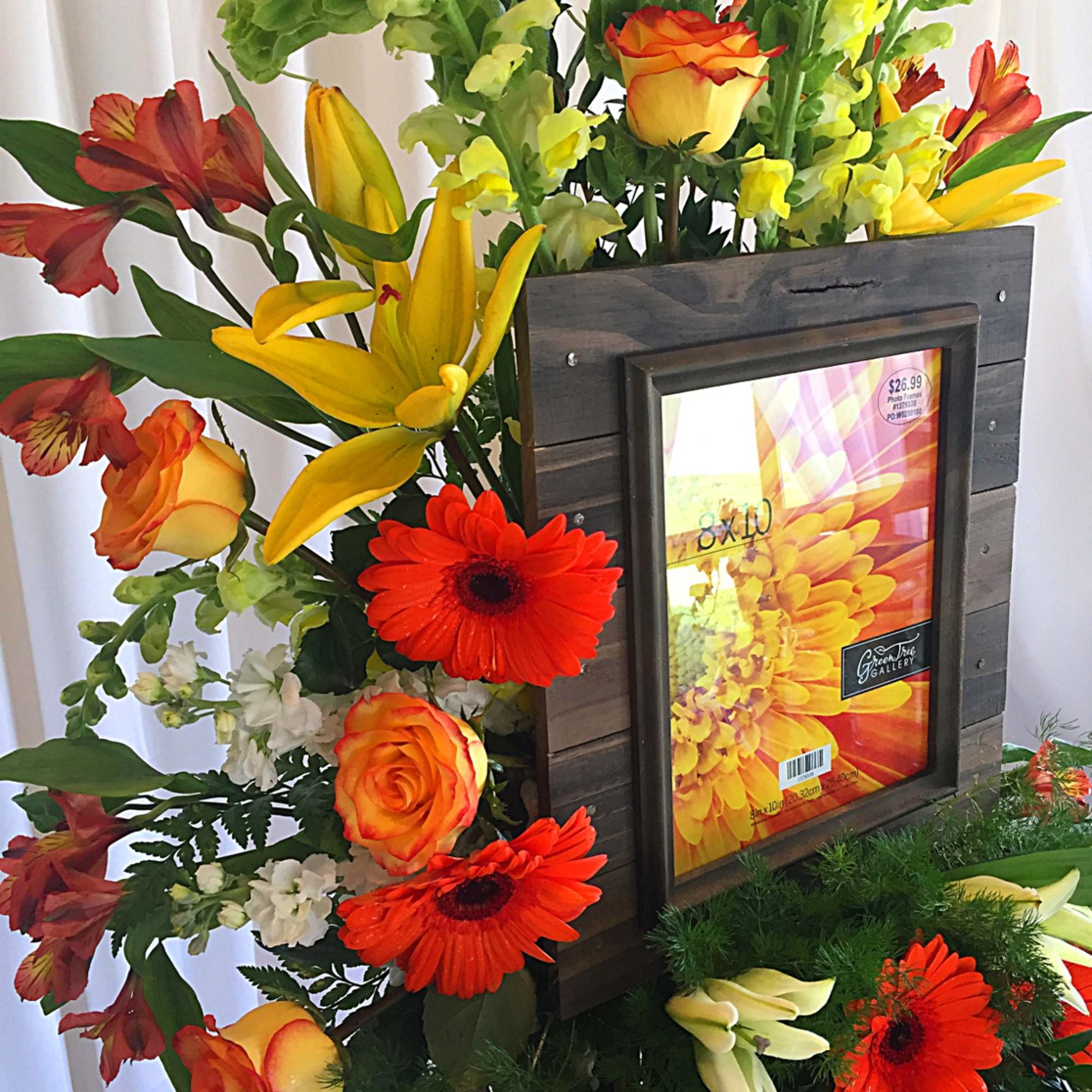 Sympathy spray featuring an 8&quot; x 10&quot; framed picture of your loved