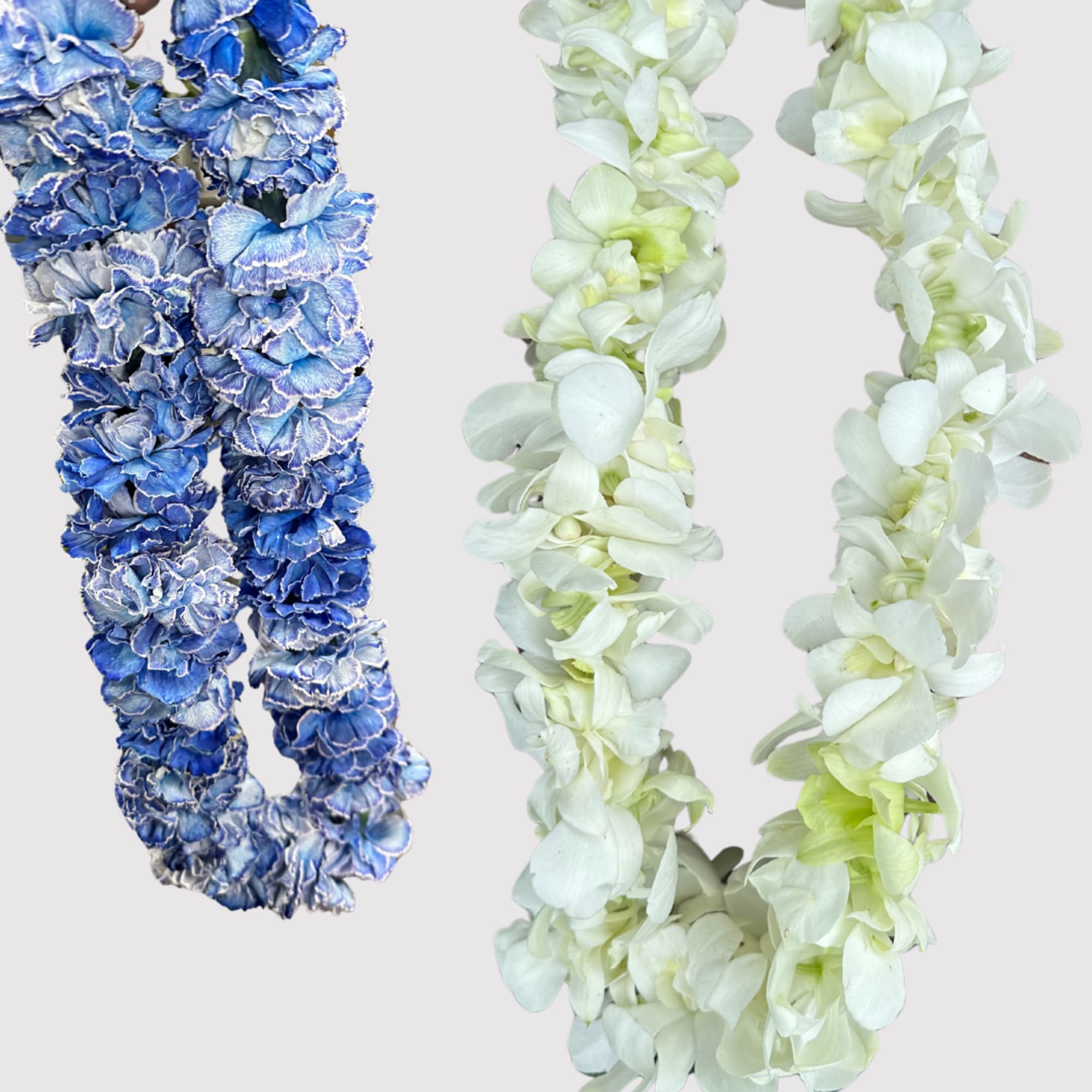 Woven by hand with fresh, seasonal blooms, our Flower Leis are a