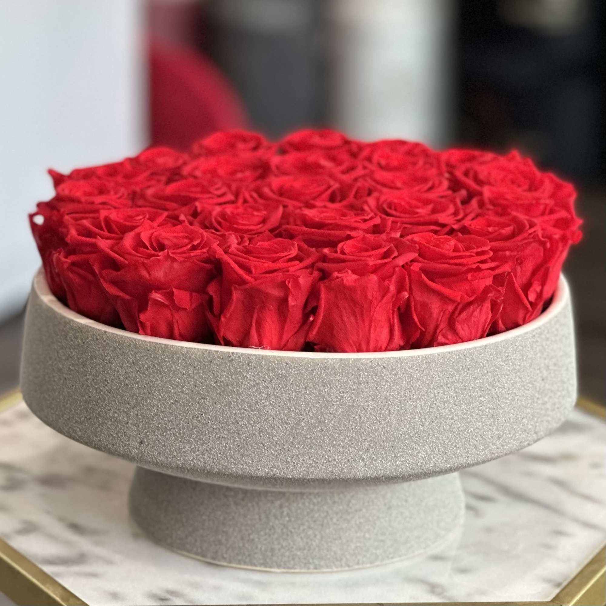 Red preserved roses in our flat vase , beautiful gift and design