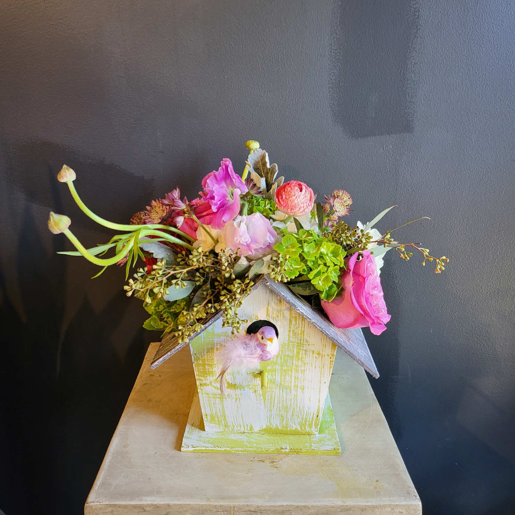 This arrangement is something that is so unique and lovable. Flowers are This arrangement is something that is so unique and lovable. Flowers are