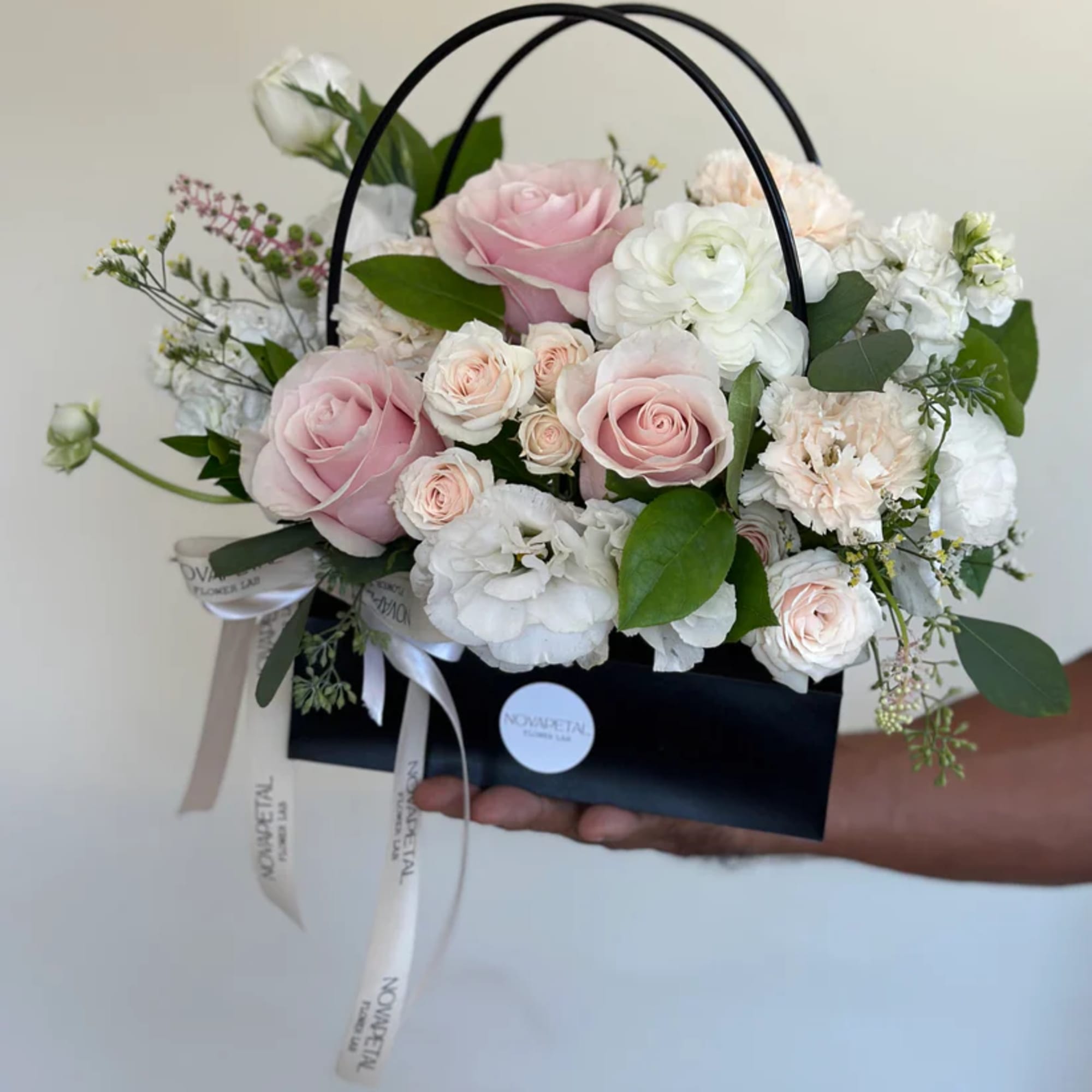 Each fresh cut floral bag  is created uniquely by one of