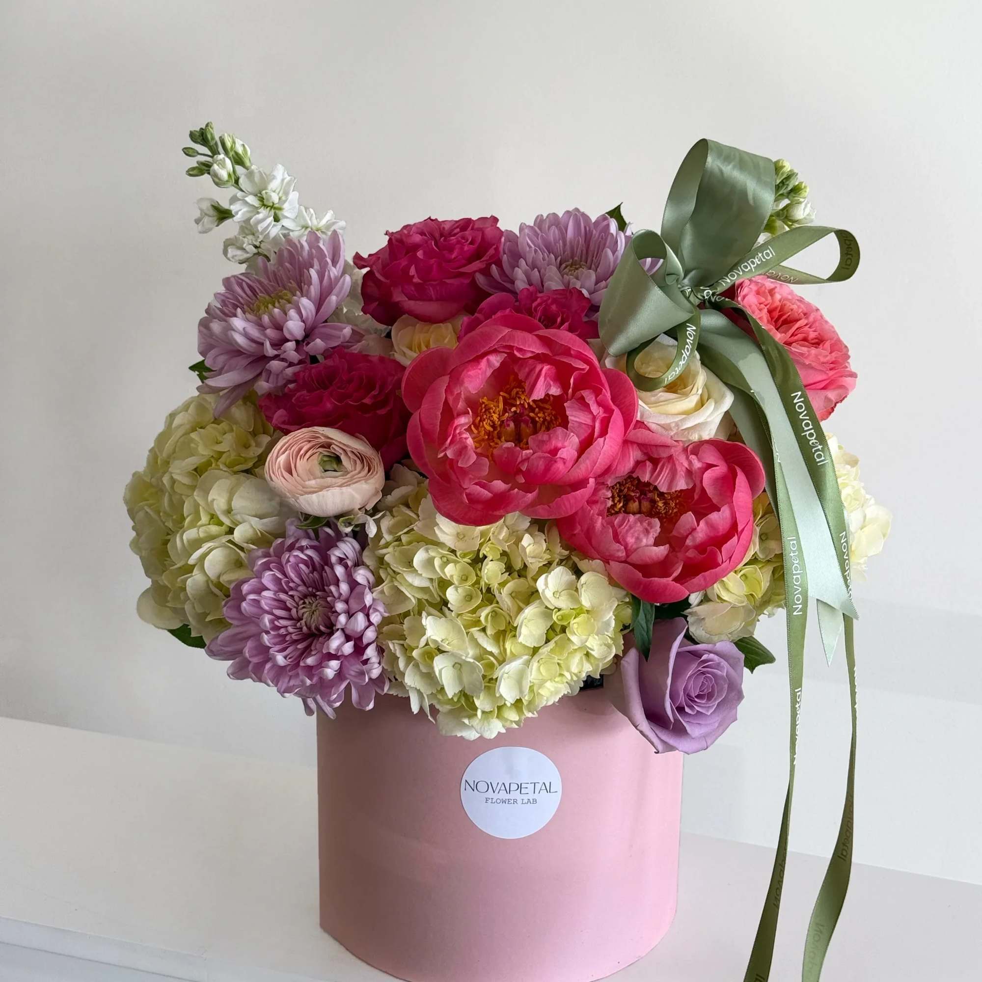 This exquisite floral arrangement is a stunning composition that exudes luxury and