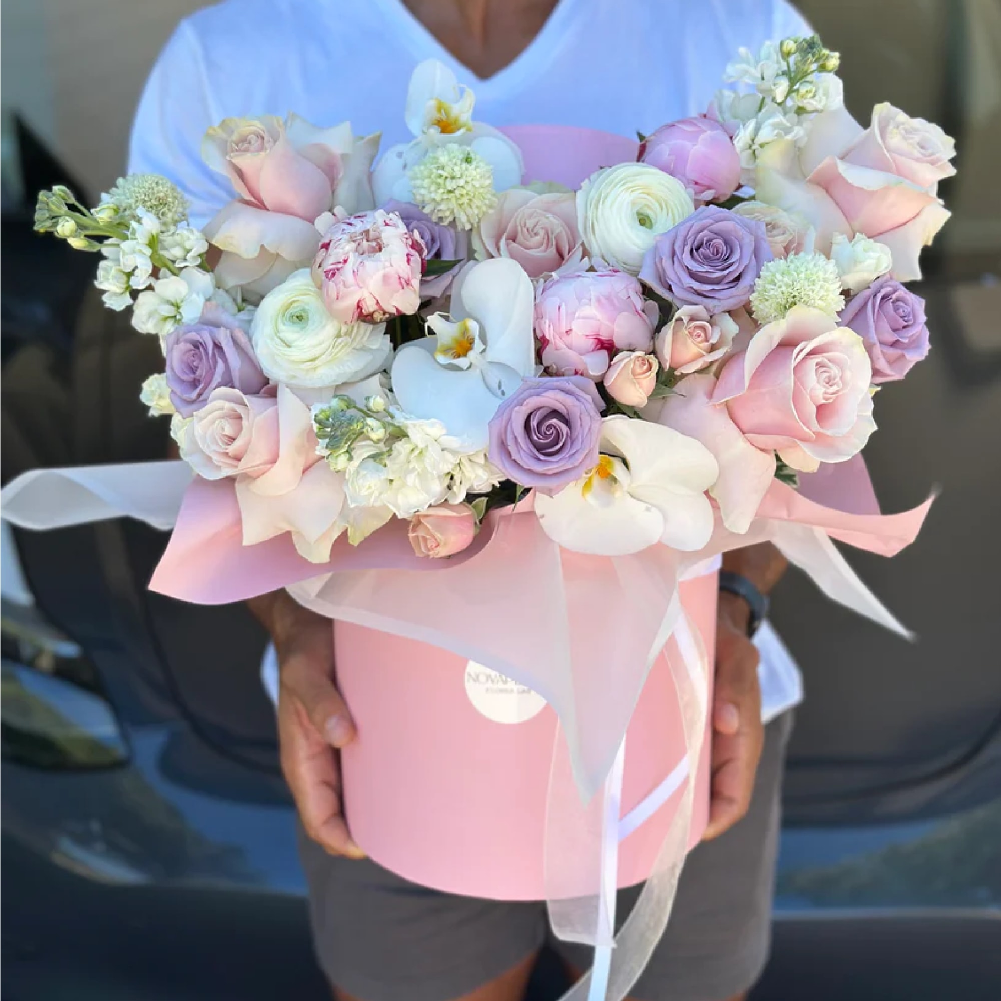 Experience the whimsical sweetness of our Candy Land Box Arrangement, skillfully crafted