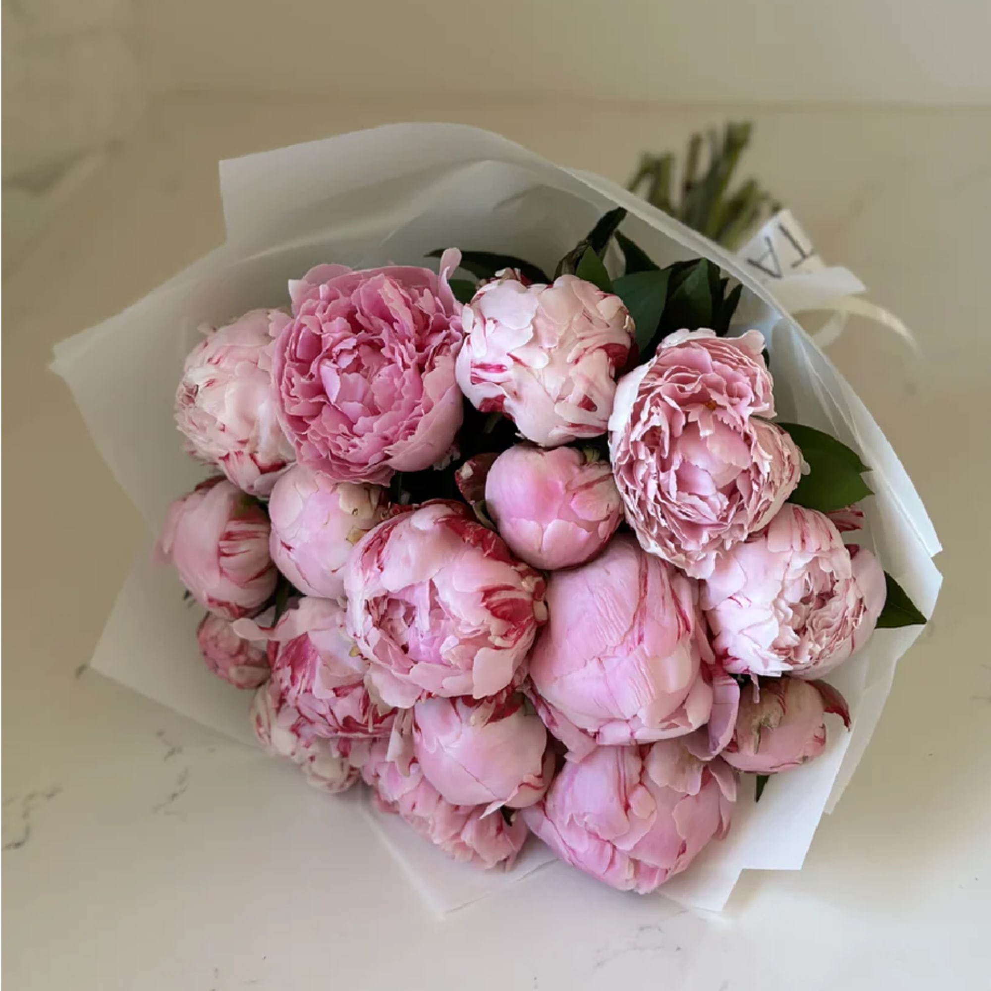 Experience luxury and elegance with our Bountiful Peony Bouquet, featuring ONLY premium