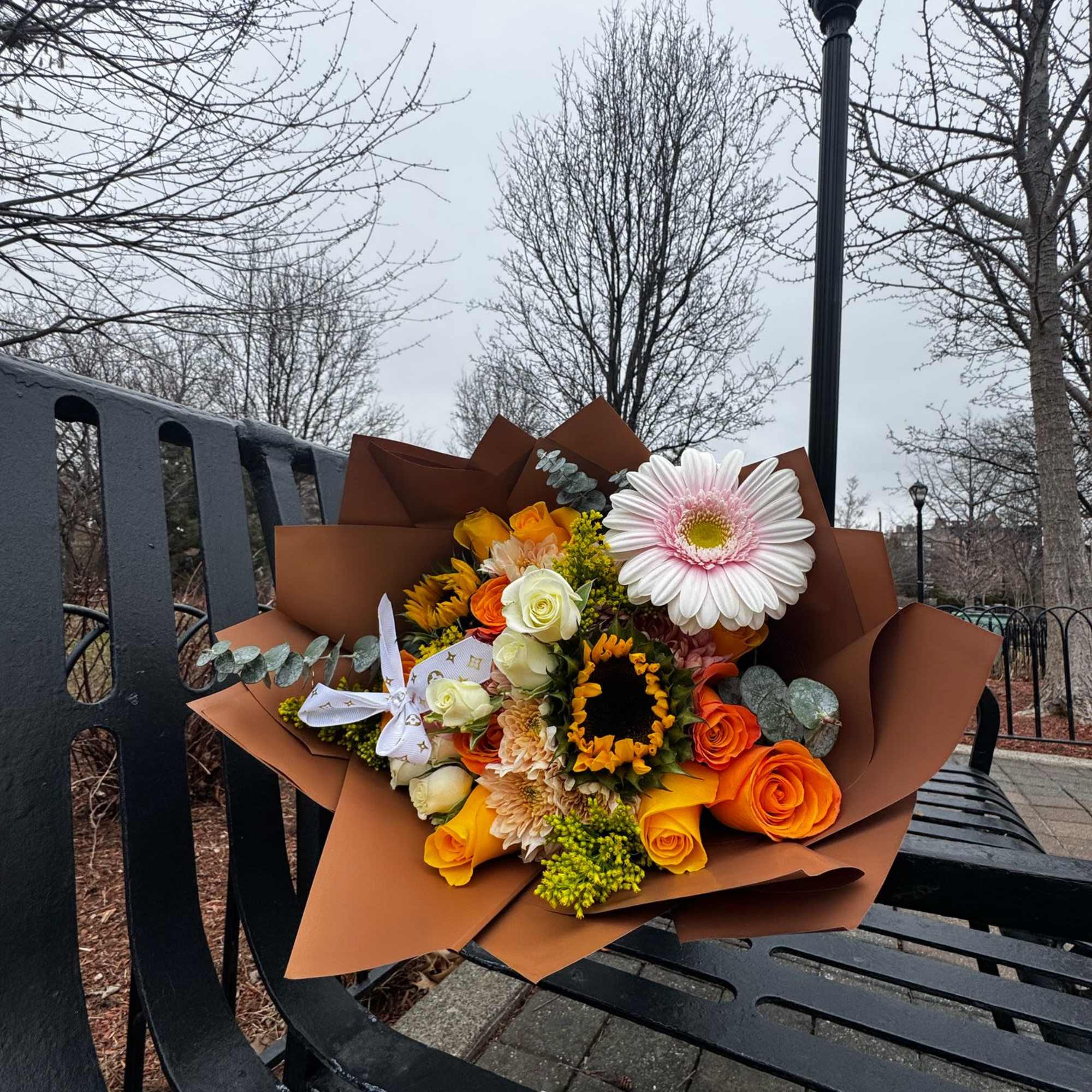 This bouquet is a vibrant and elegant composition with a captivating combination