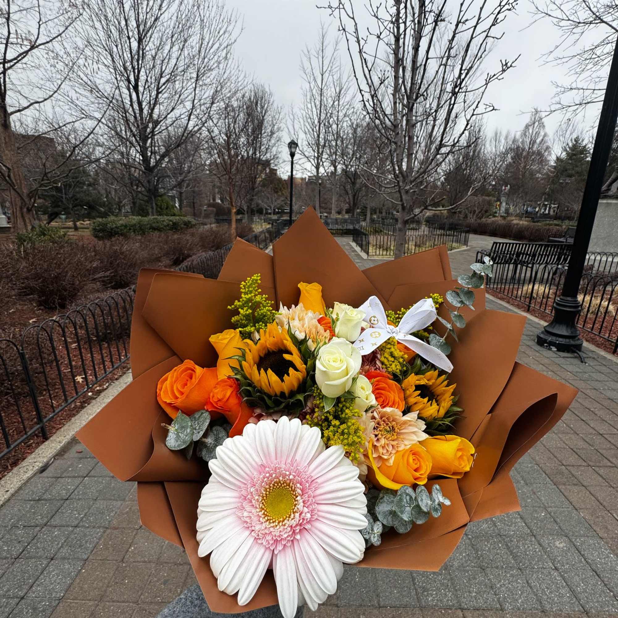 This bouquet is a vibrant and elegant composition with a captivating combination