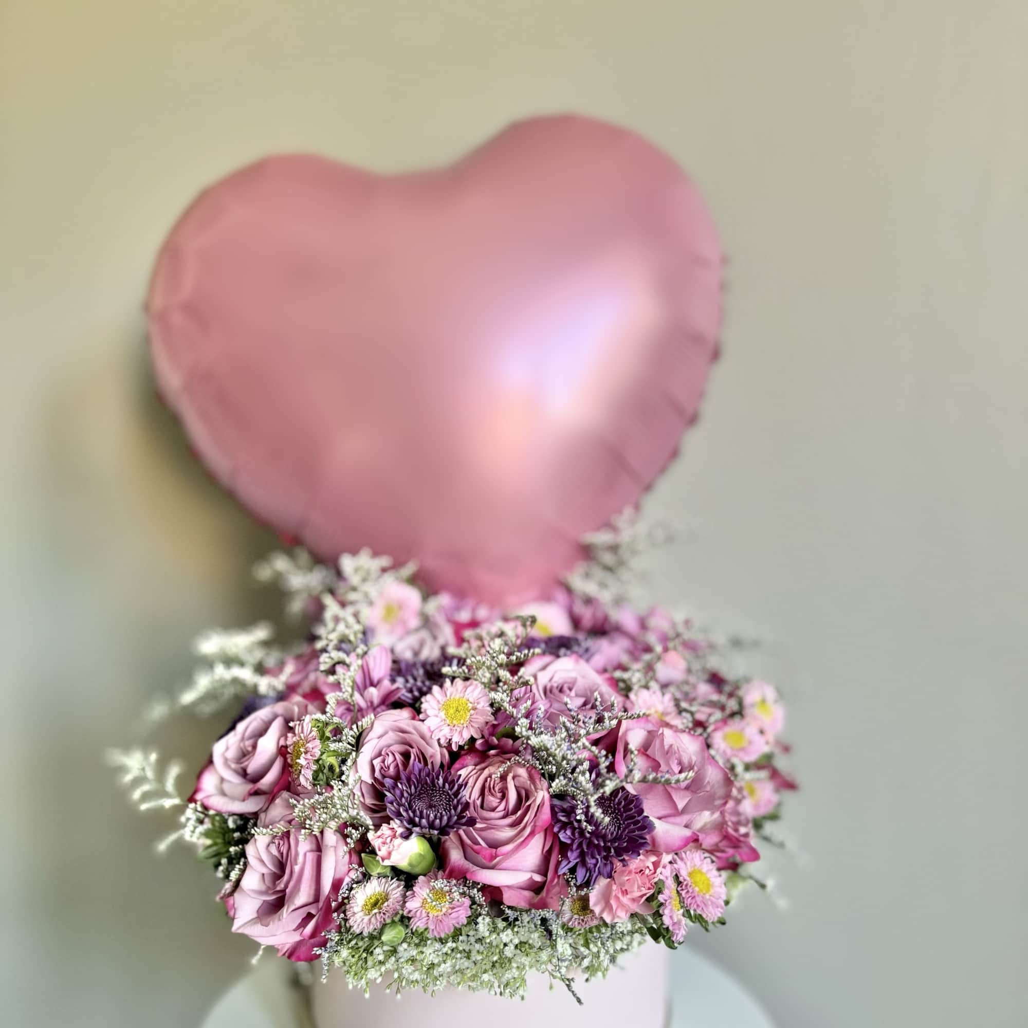 Flowers, Color, and Style chosen by the Florist. These arrangements are a