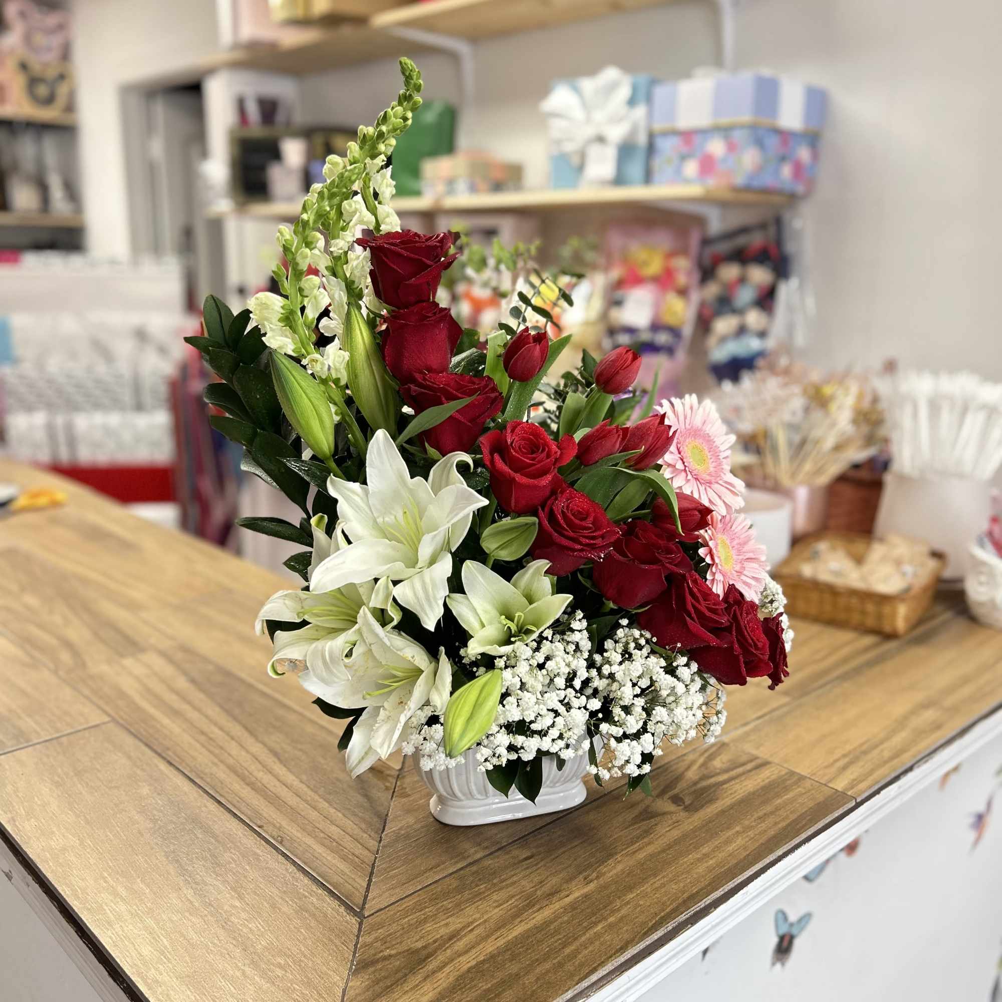 Surprise that special person with this beautiful  floral arrangement, with 9