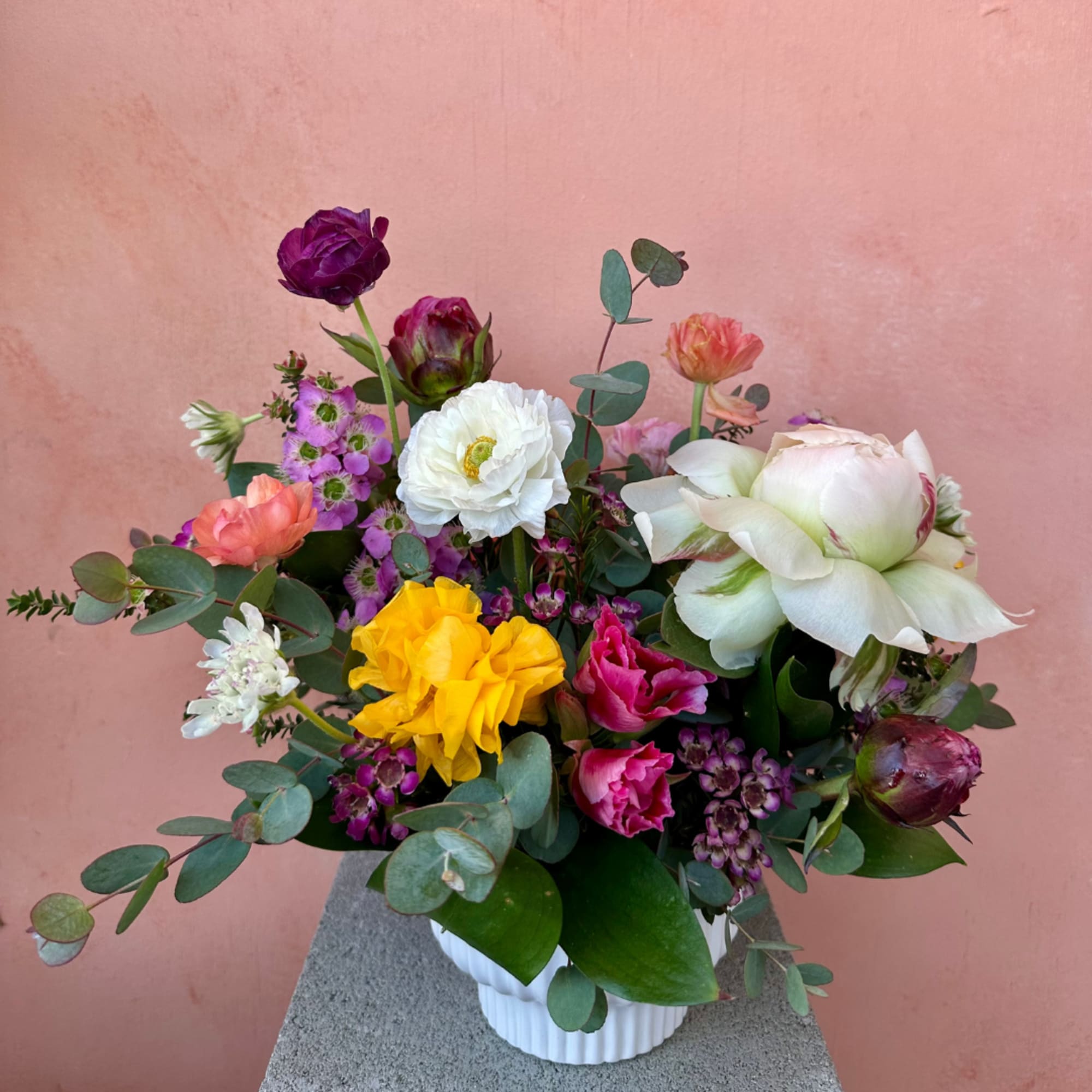 A charming petite arrangement, ideal for small spaces or thoughtful gifts. Locally