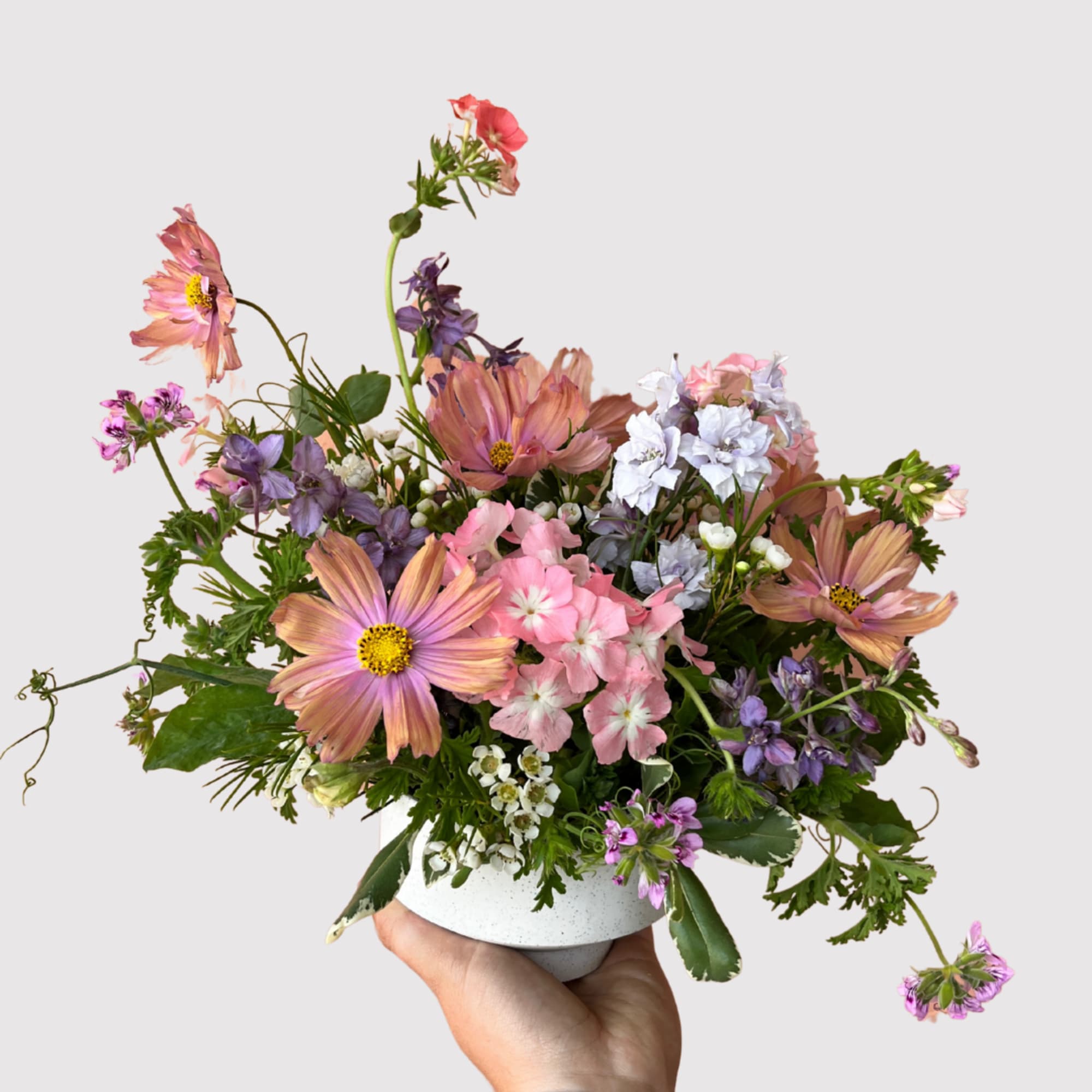 A charming petite arrangement, ideal for small spaces or thoughtful gifts. Locally