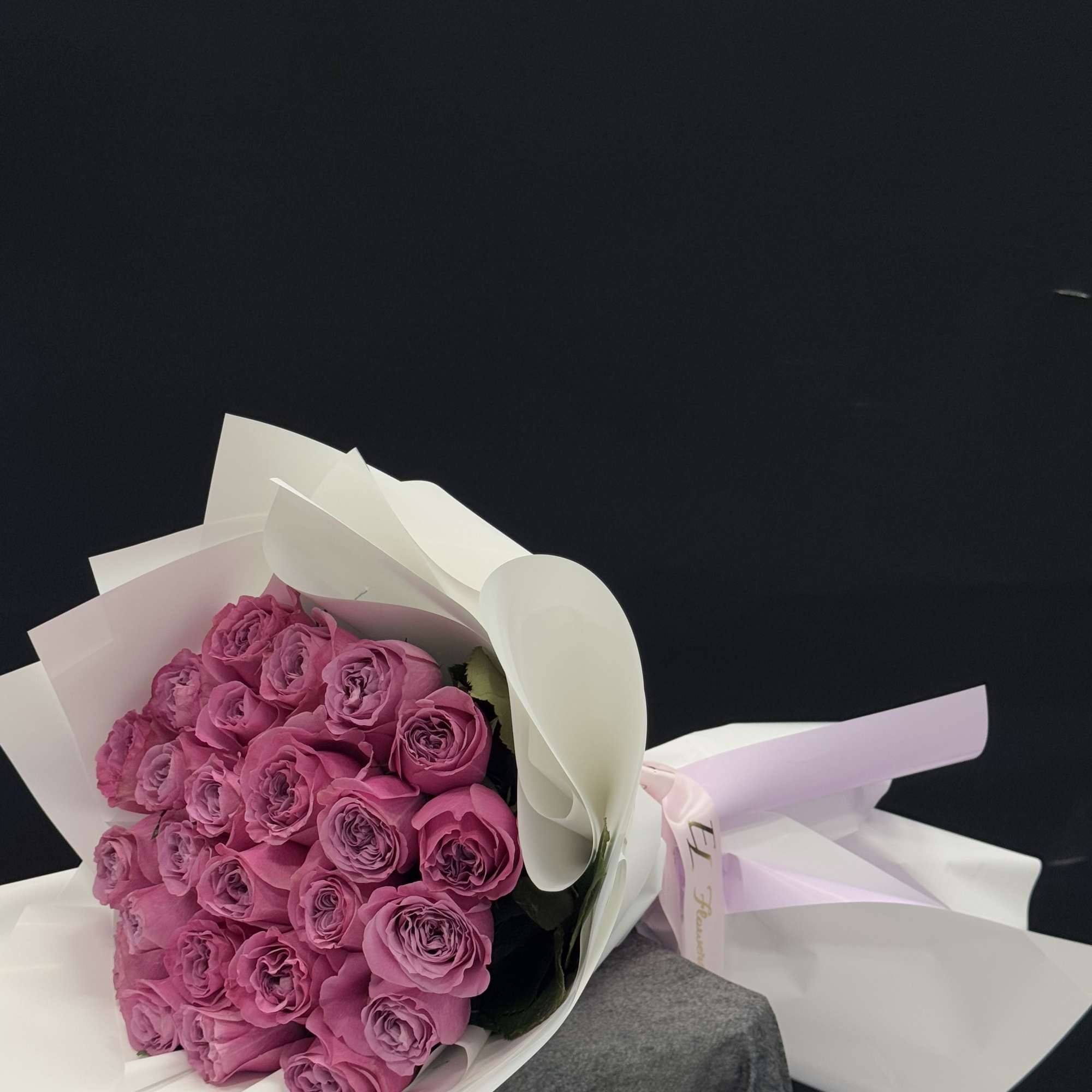 Beautiful wrapped purple roses
