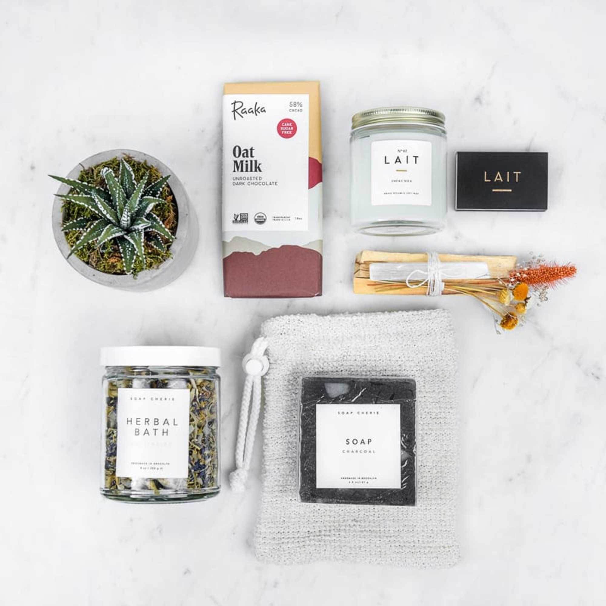 Featuring Succulent Planter, Lait Soy Wax Candle, Lait Matches, Raaka Chocolate, Selenite