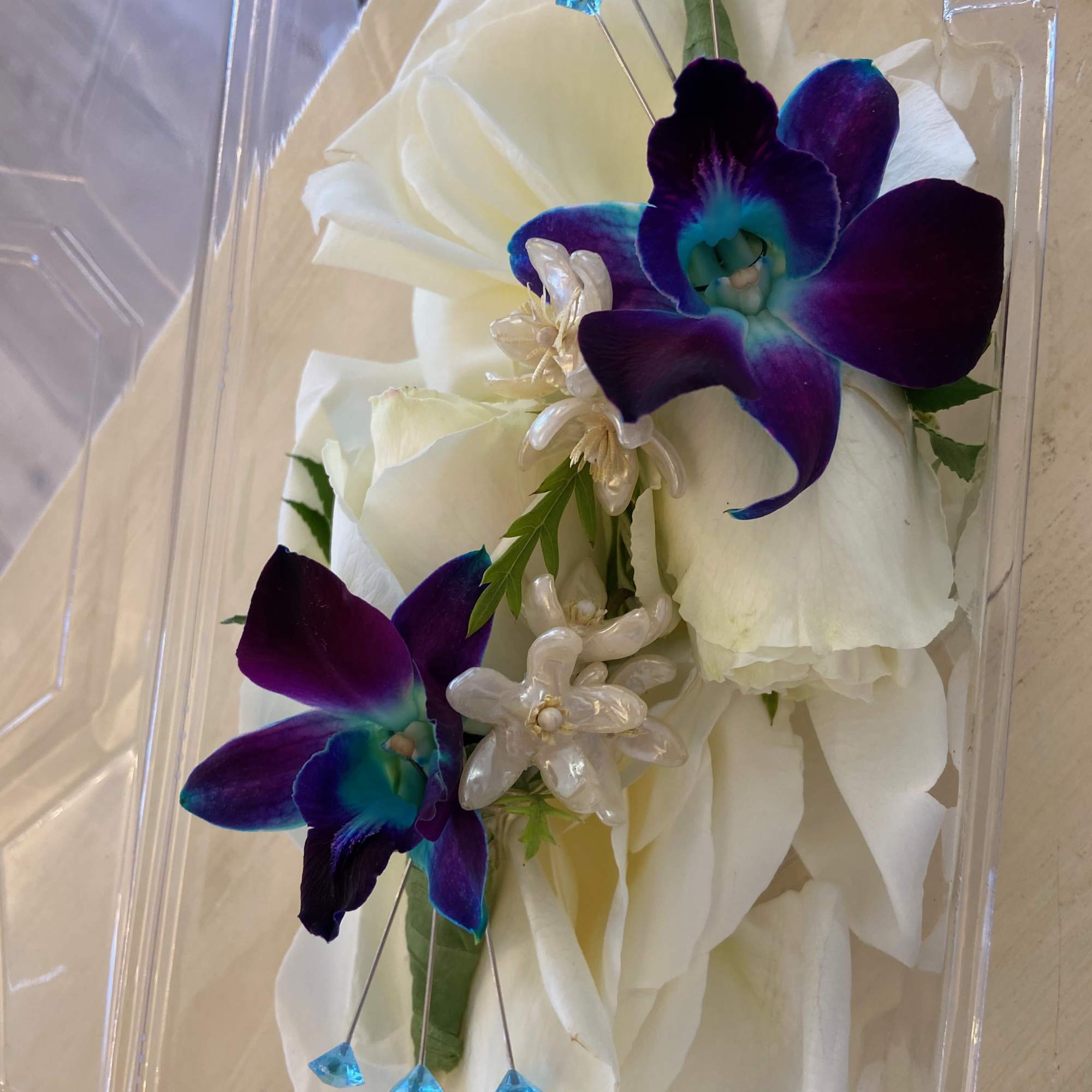 This beauty of blue and pearl is the prefect wristlet for your