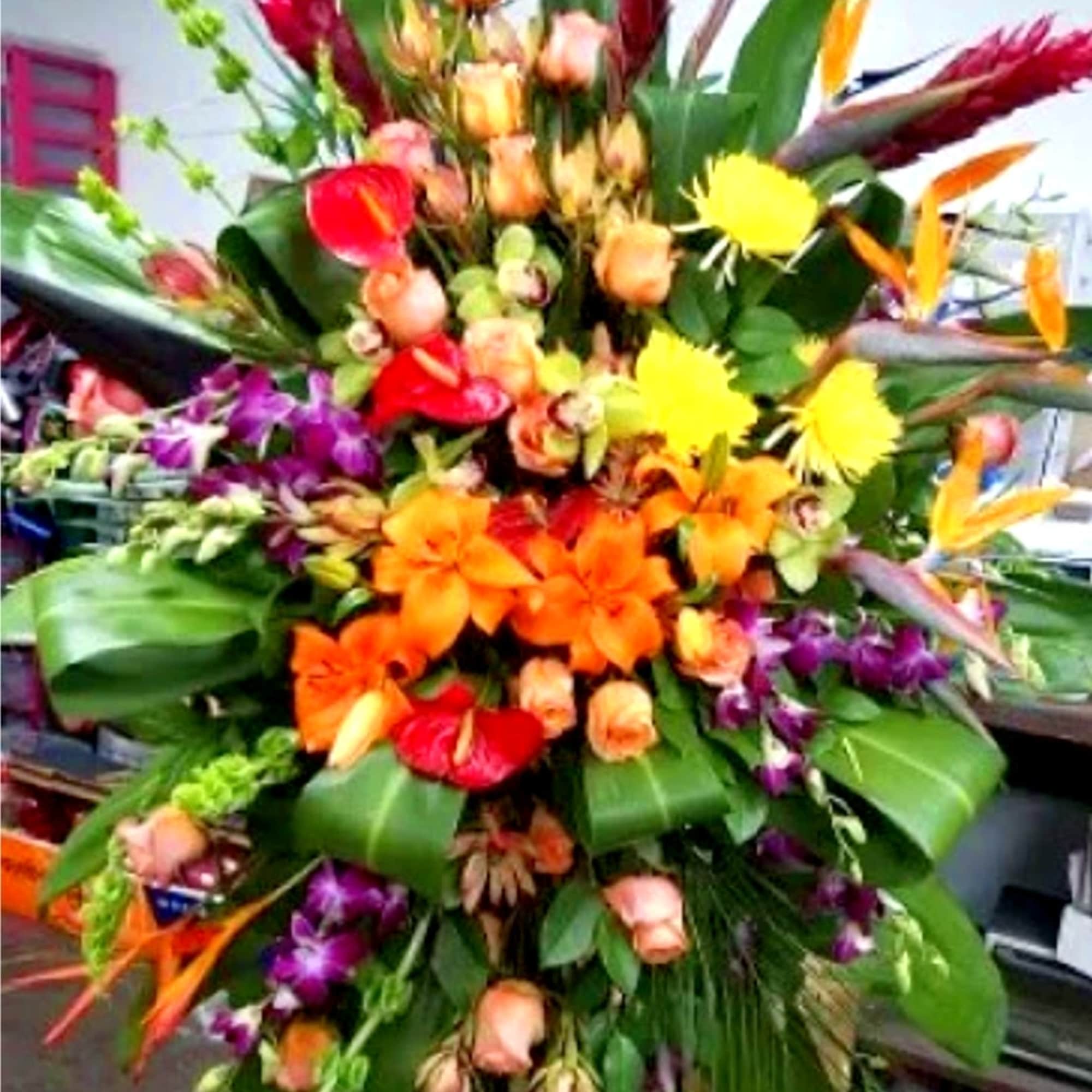 We make a large and beautiful tropical funeral spray with orchids and We make a large and beautiful tropical funeral spray with orchids and