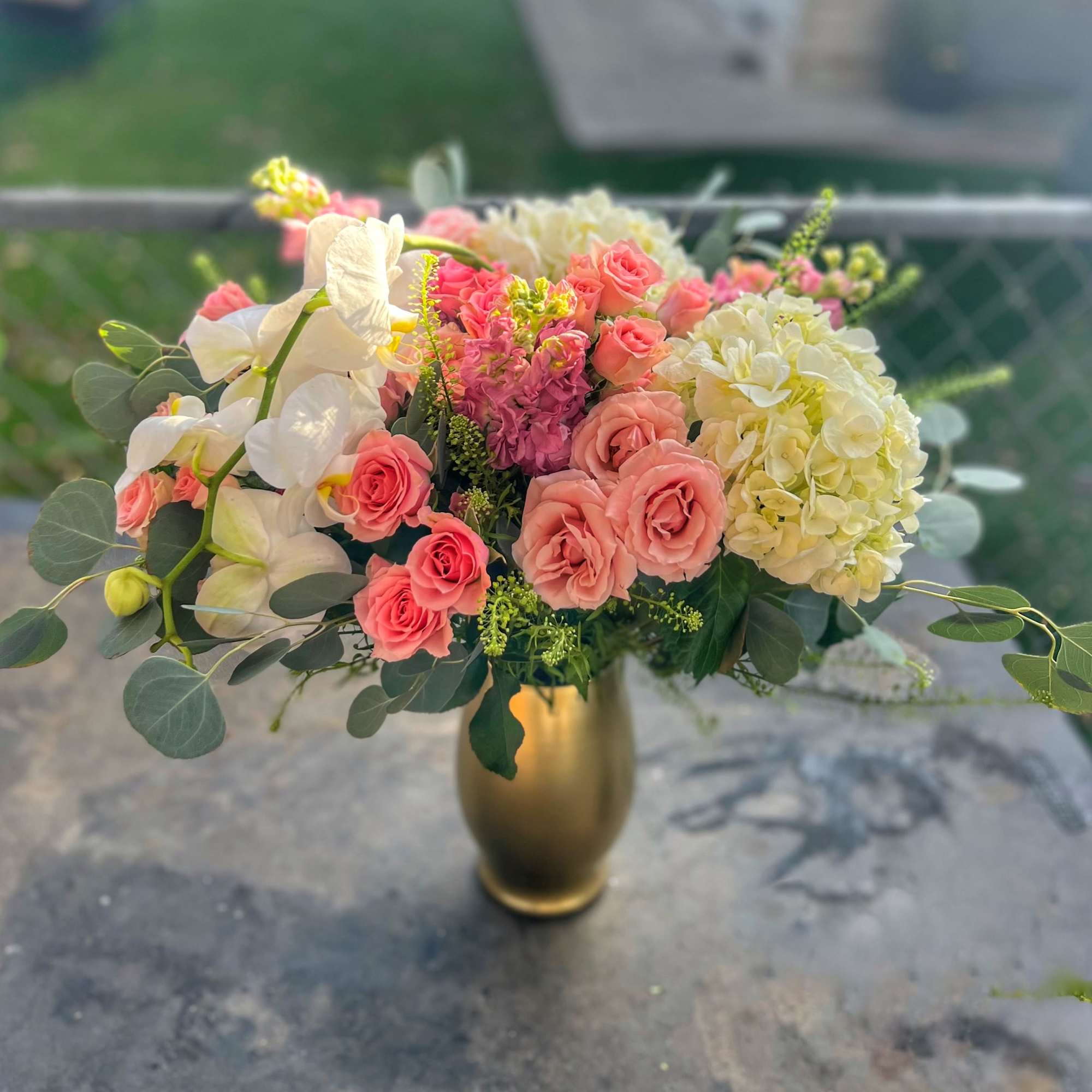 A Glamorous and cute arrangement for any occasion or for THE occasion.