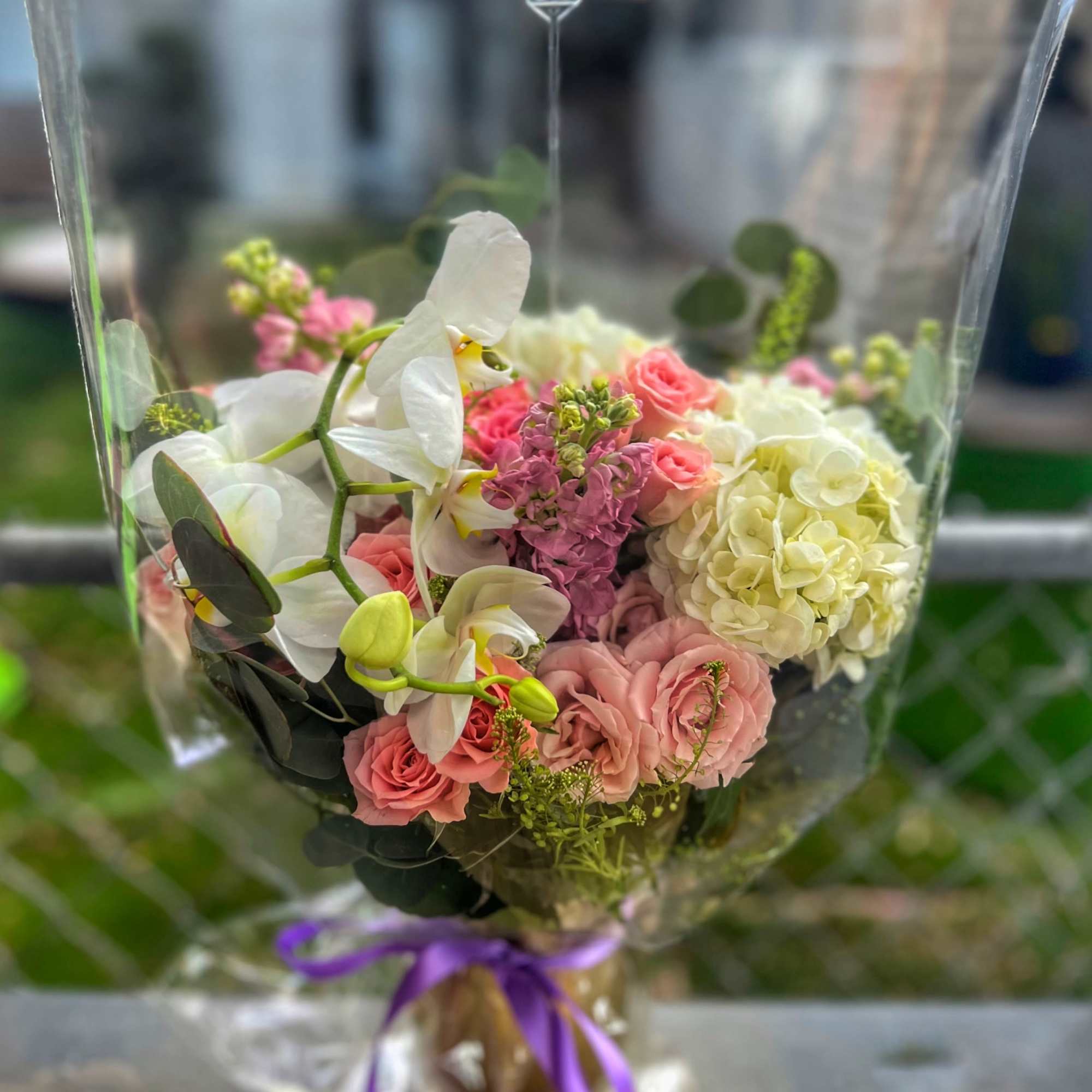 A Glamorous and cute arrangement for any occasion or for THE occasion.