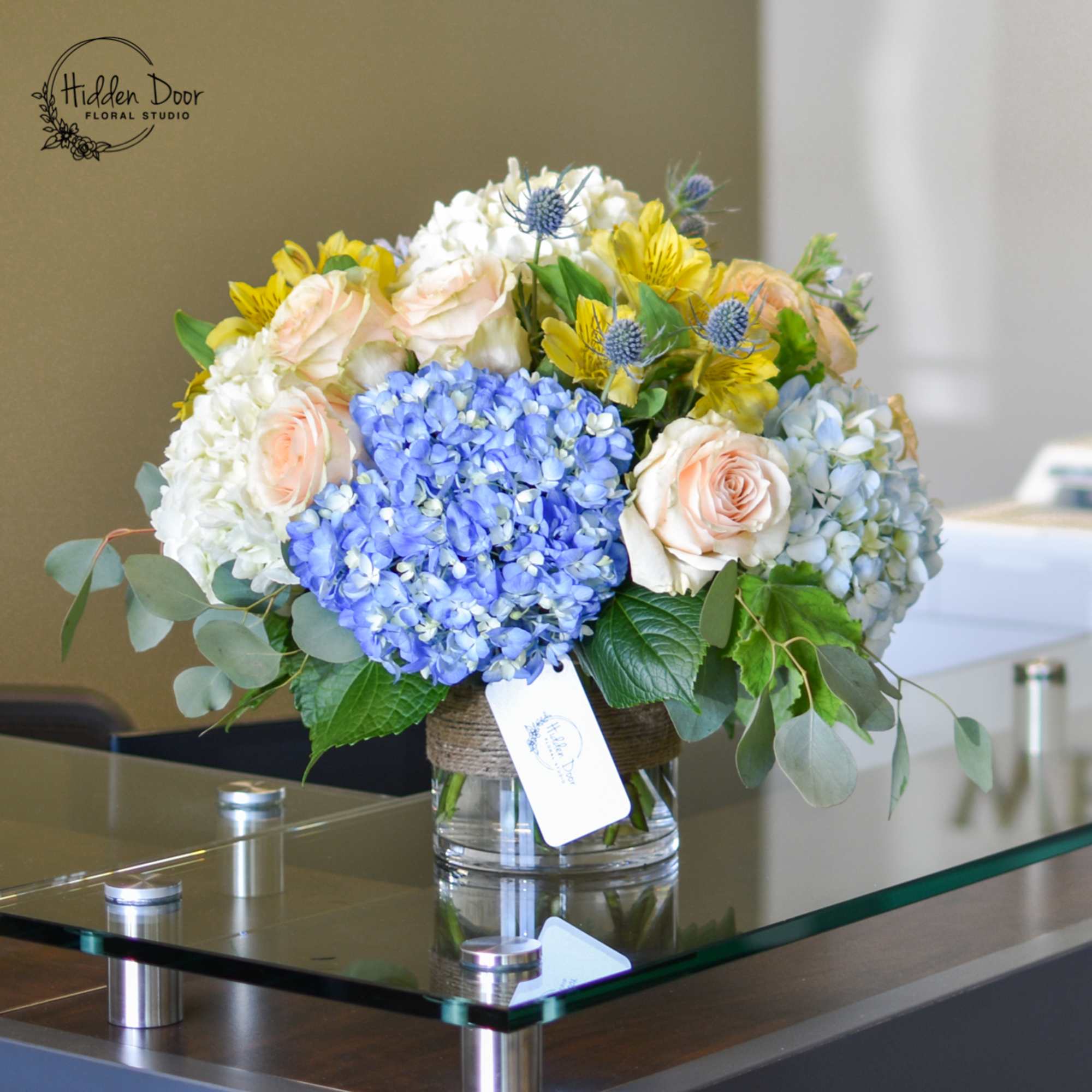 

The &quot;Catalina&quot; arrangement features the radiant yellow of alstroemeria, symbolizing the warmth
