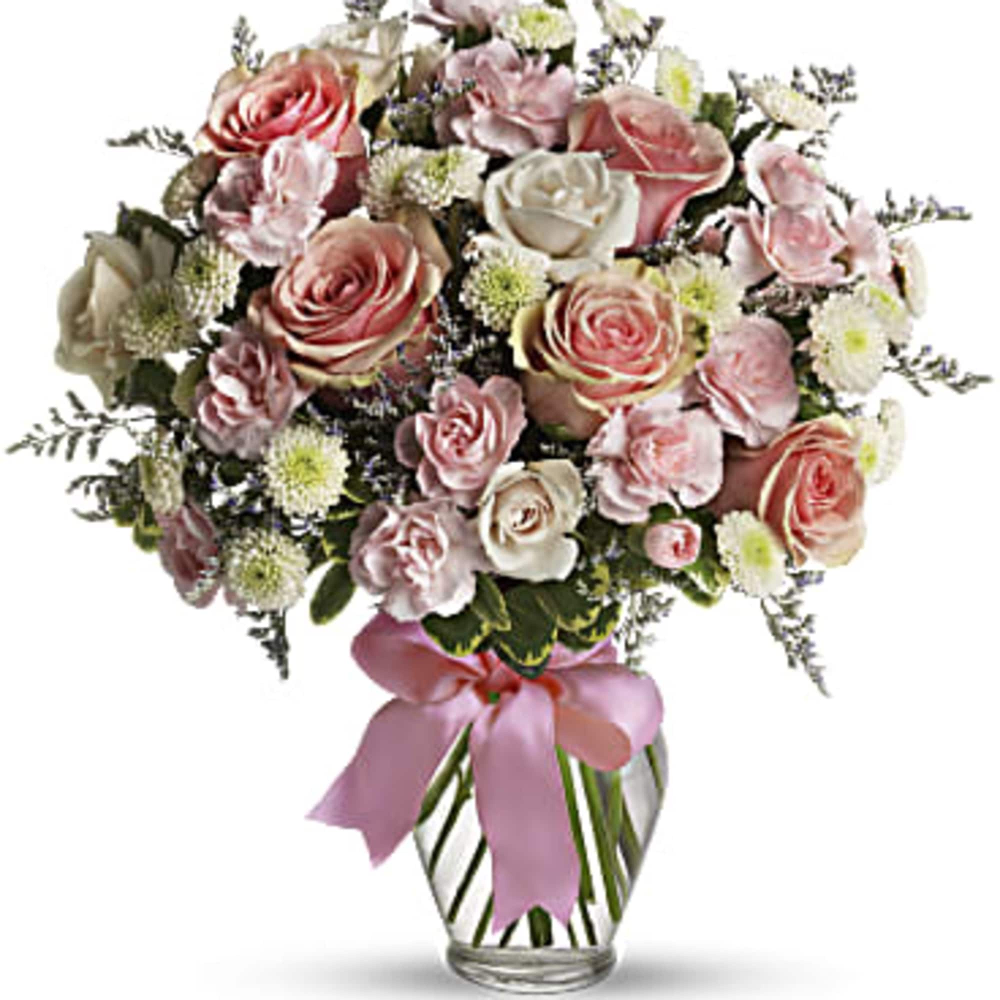 As sweet as candy! This soft pink and white bouquet fills a
