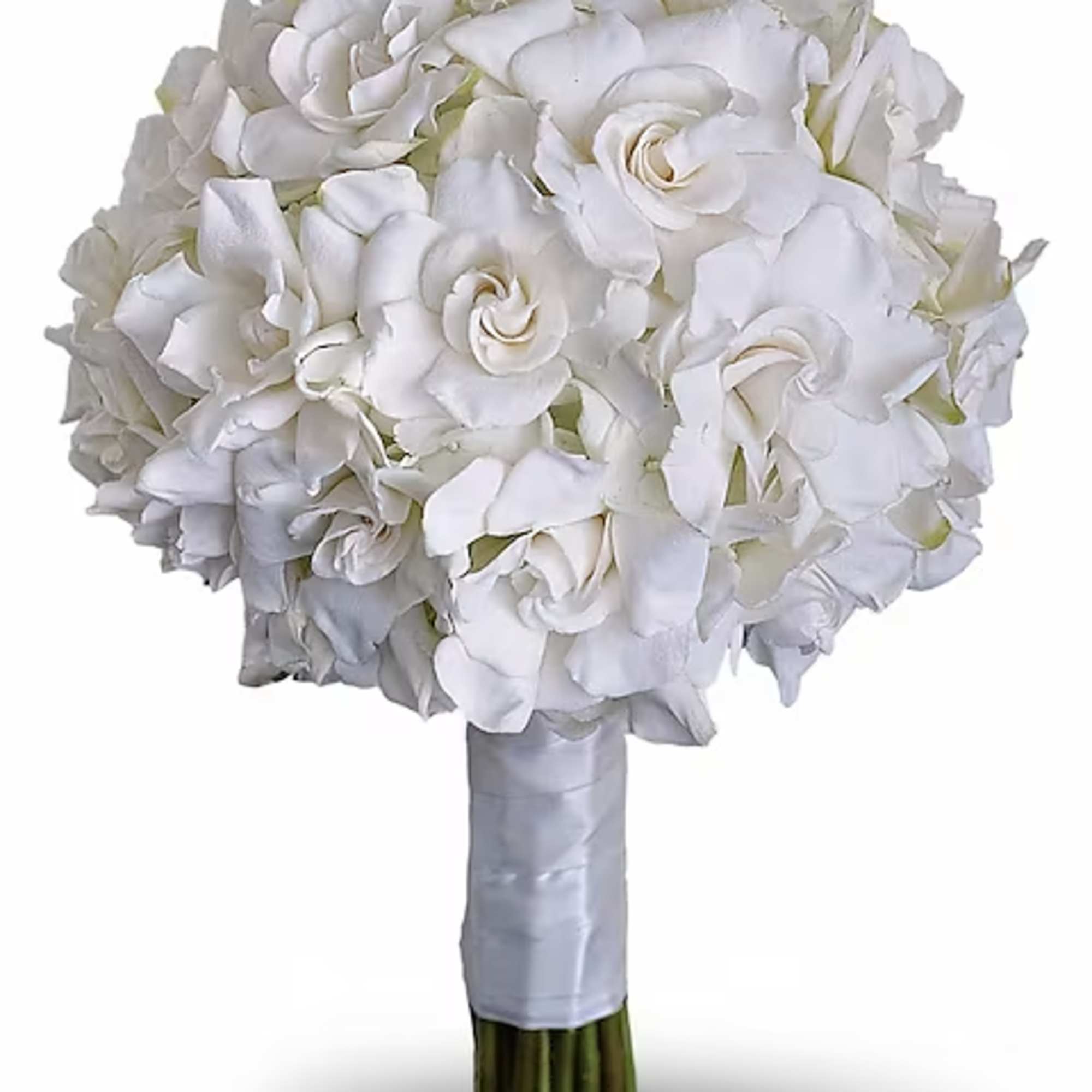 Beloved for their enchanting fragrance, gardenias are gathered with hydrangea and roses