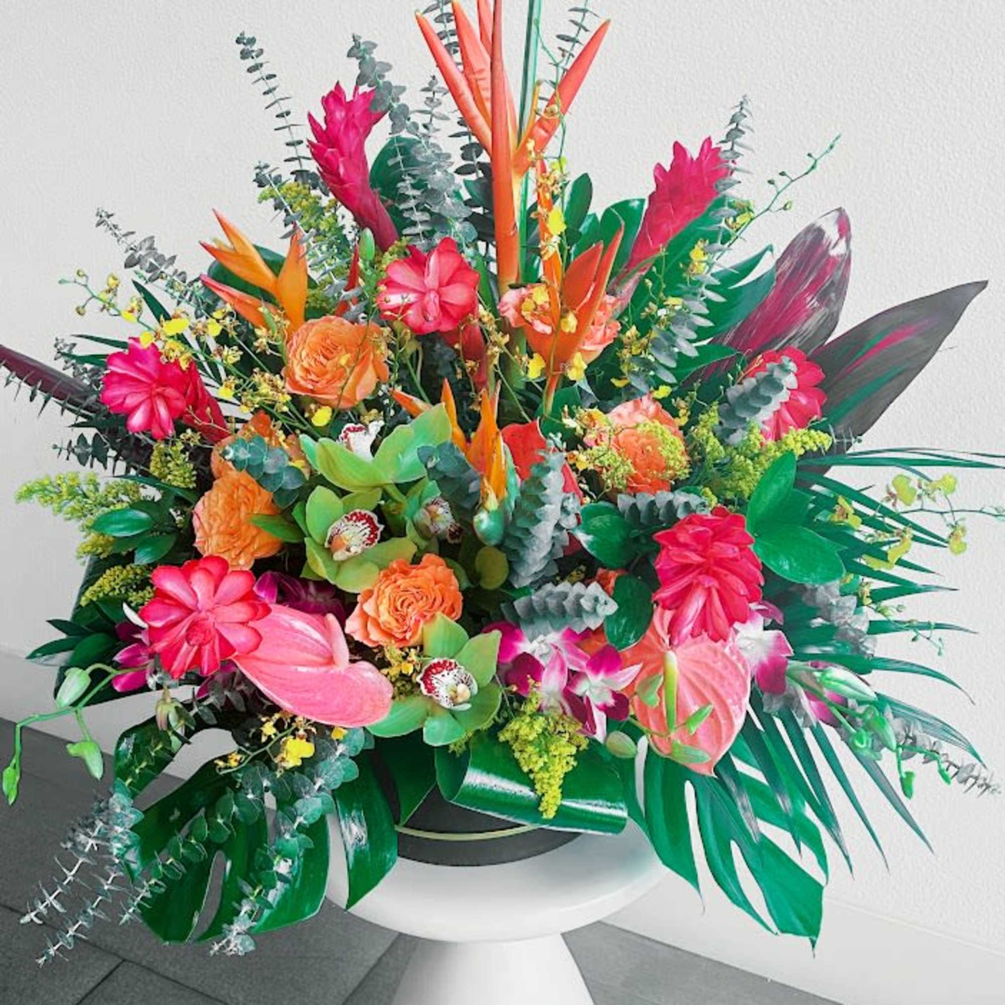 This delightful floral arrangement features a harmonious blend of colors and textures. This delightful floral arrangement features a harmonious blend of colors and textures.
