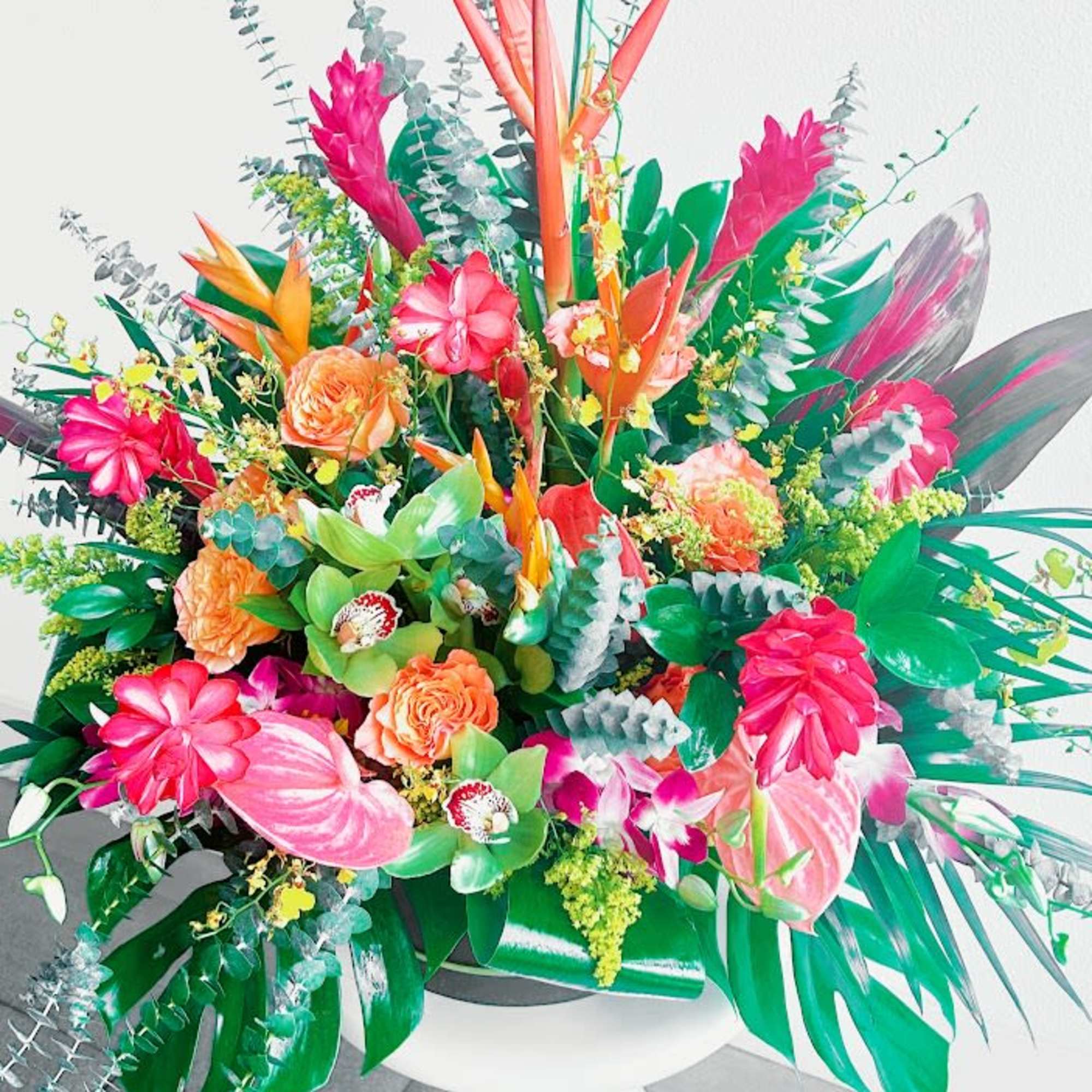 This delightful floral arrangement features a harmonious blend of colors and textures. This delightful floral arrangement features a harmonious blend of colors and textures.