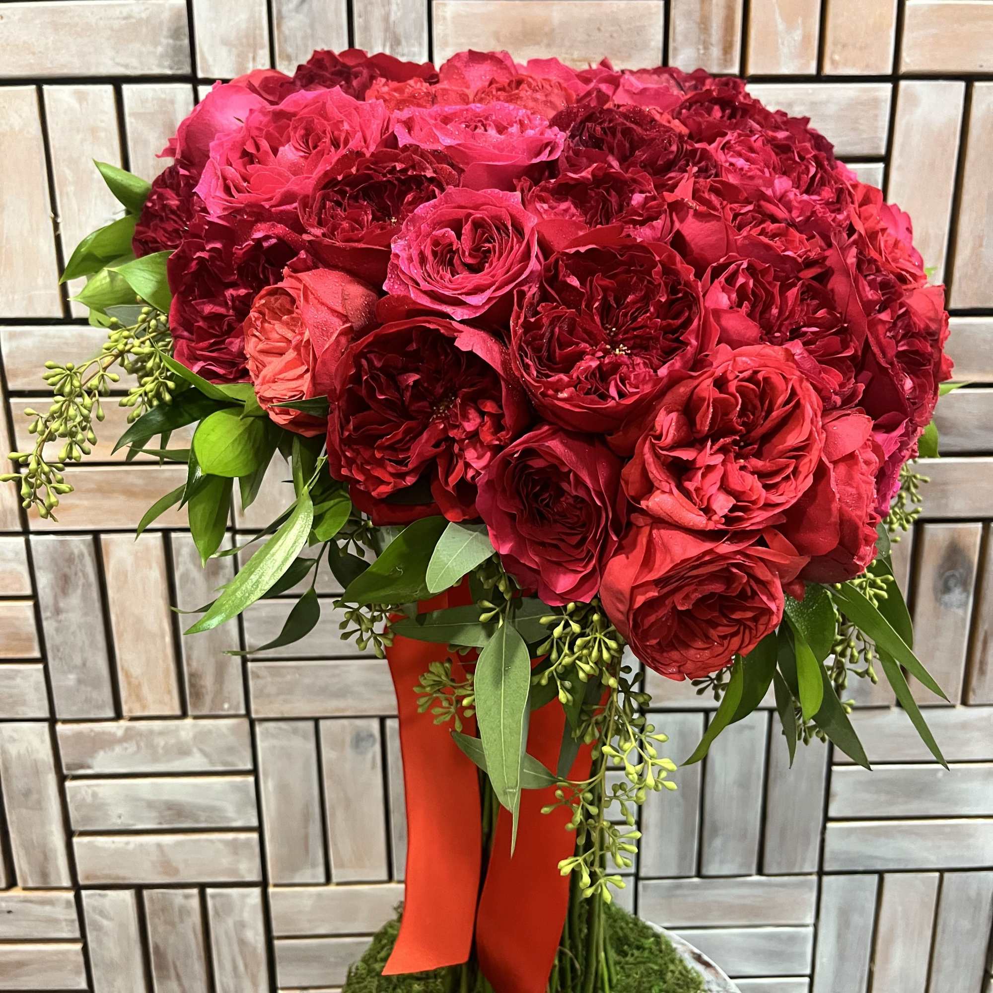 This elegant standing heart art piece is crafted from high-quality wood, designed