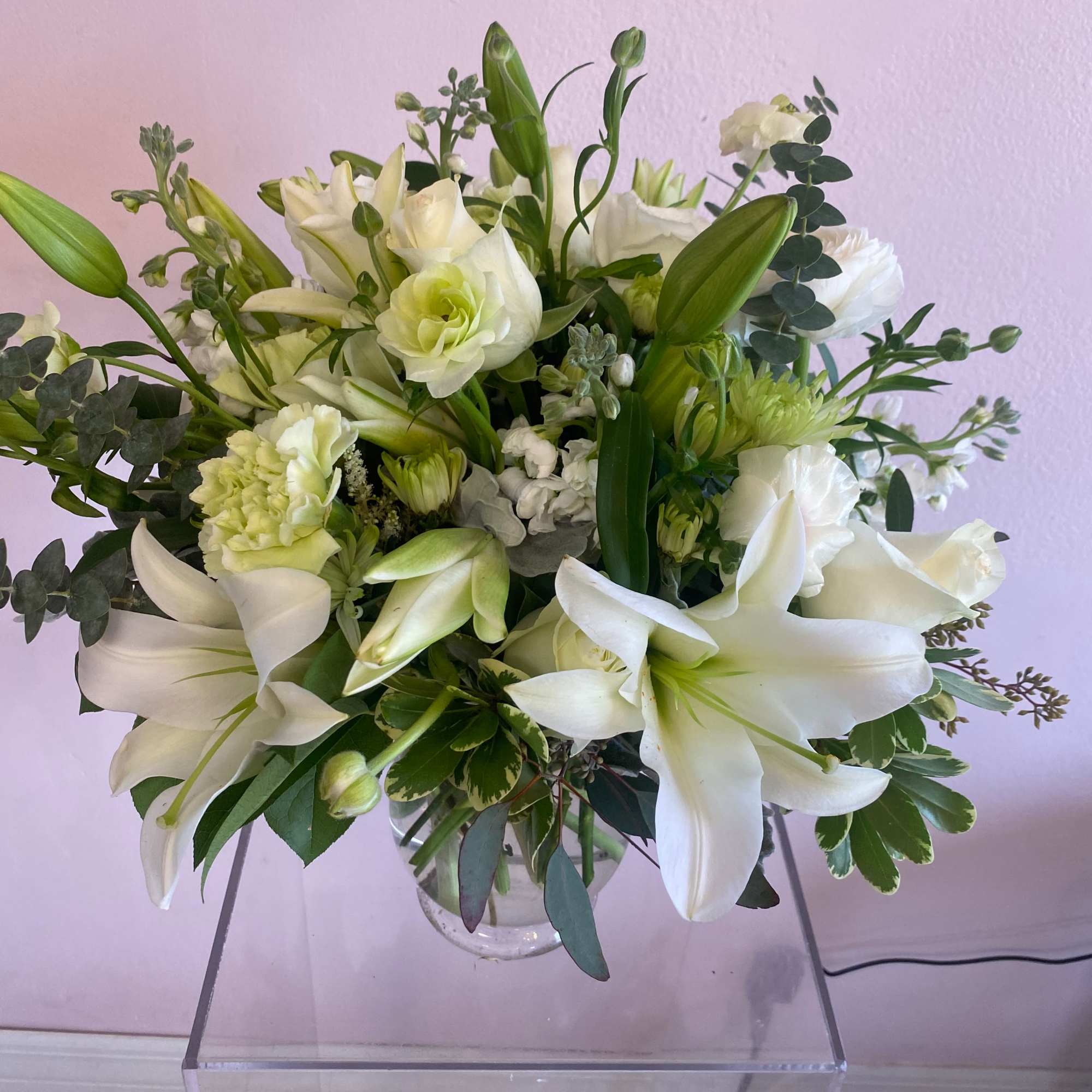 A simple way to show your affection. Lilies, roses, eucalyptus and carnations