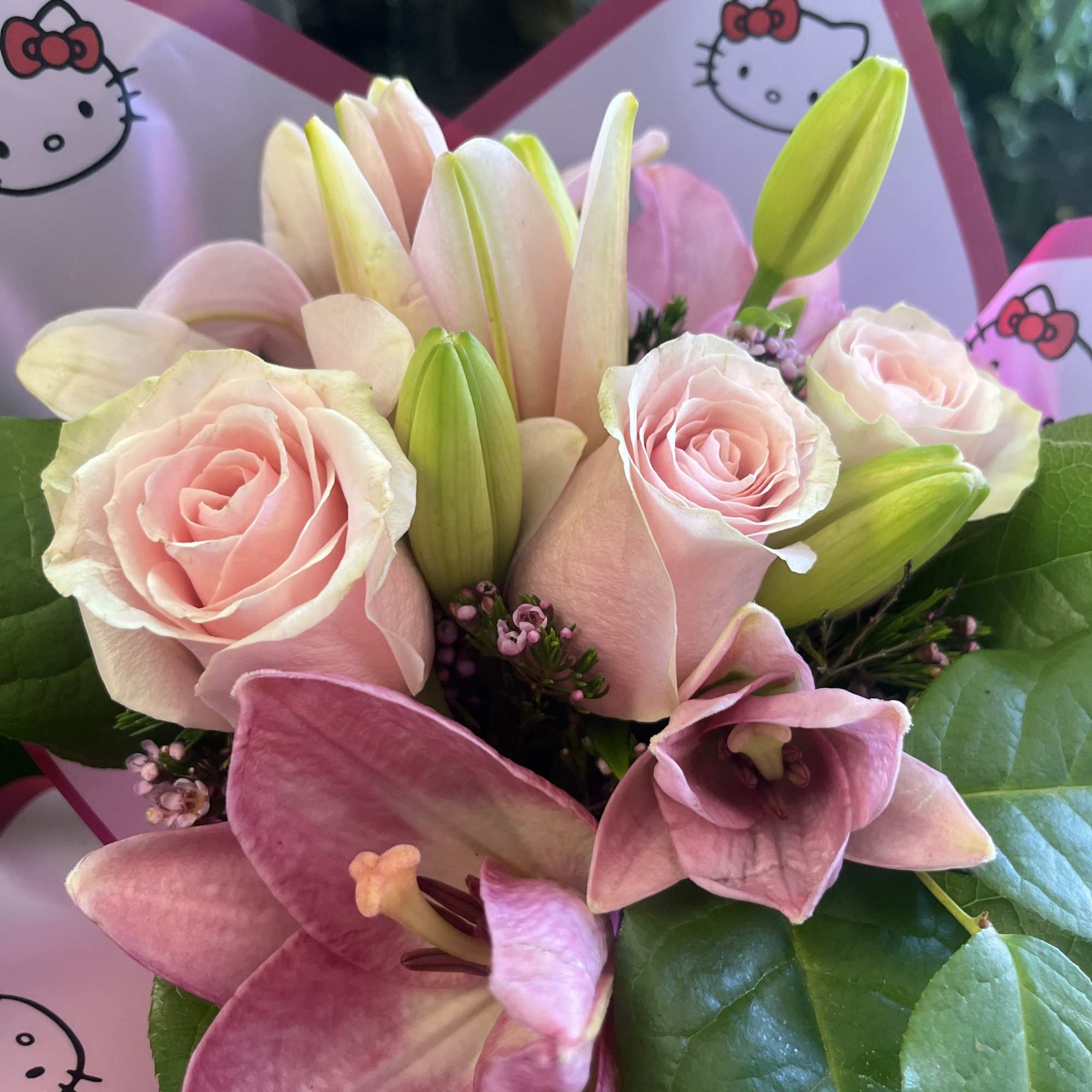 Pink Flower wrap with lilies roses  wax and lemon leaves 