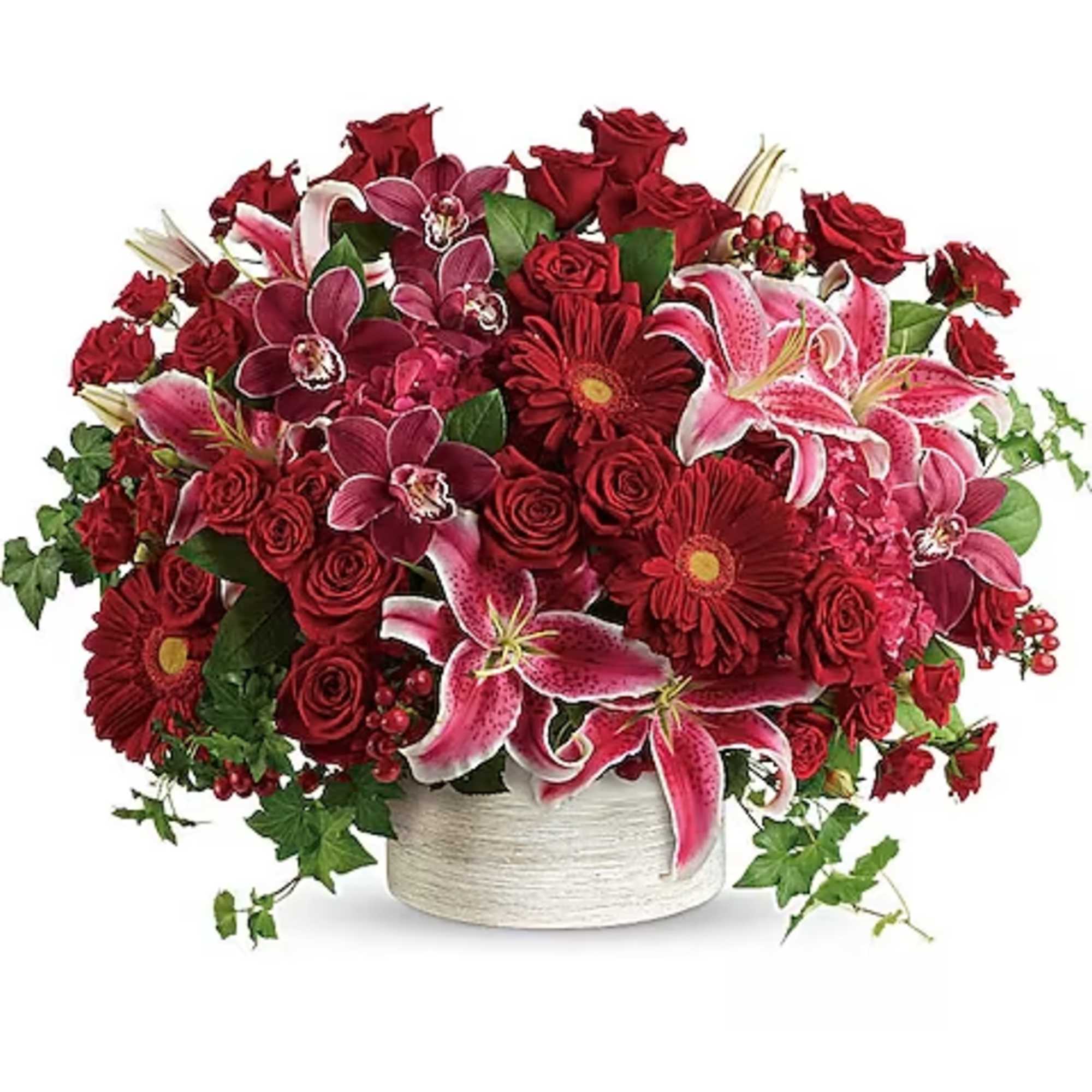 Brimming with hydrangea, orchids, roses and lilies in fabulous fuchsias and radiant