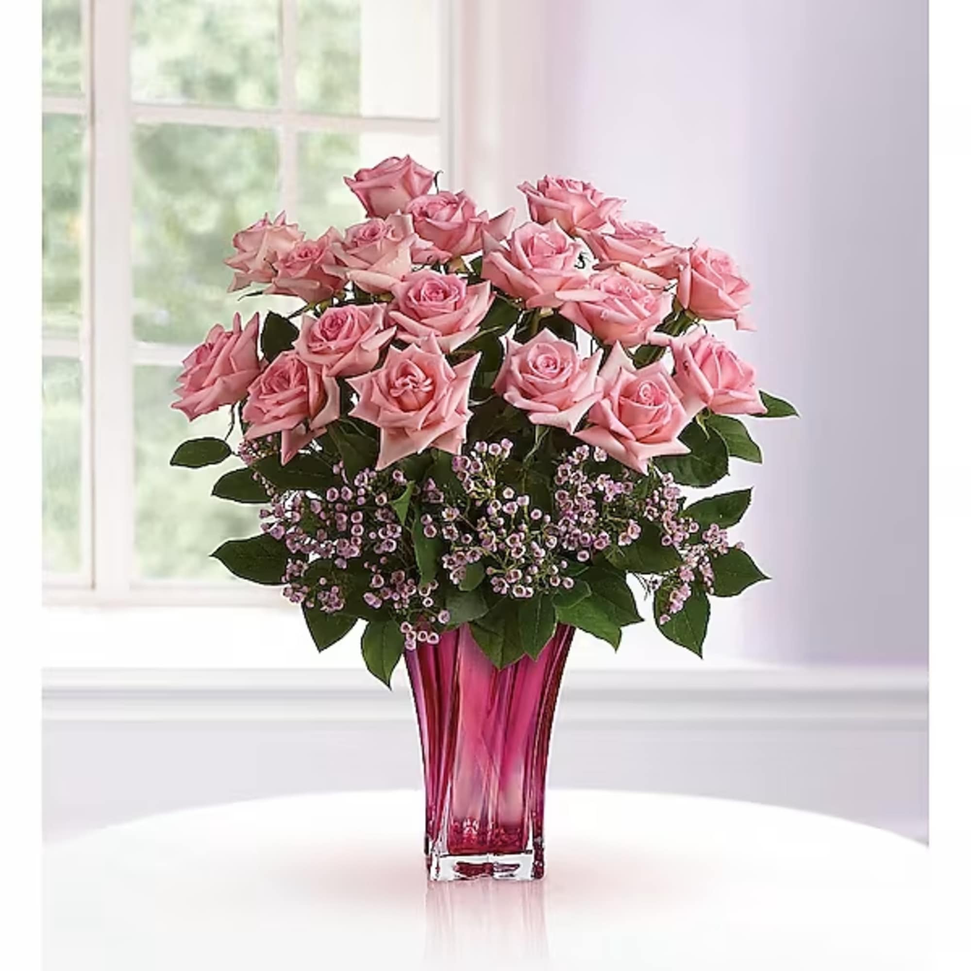Perfectly pink! Beautifully simple, this exquisite mix of soft pink roses and