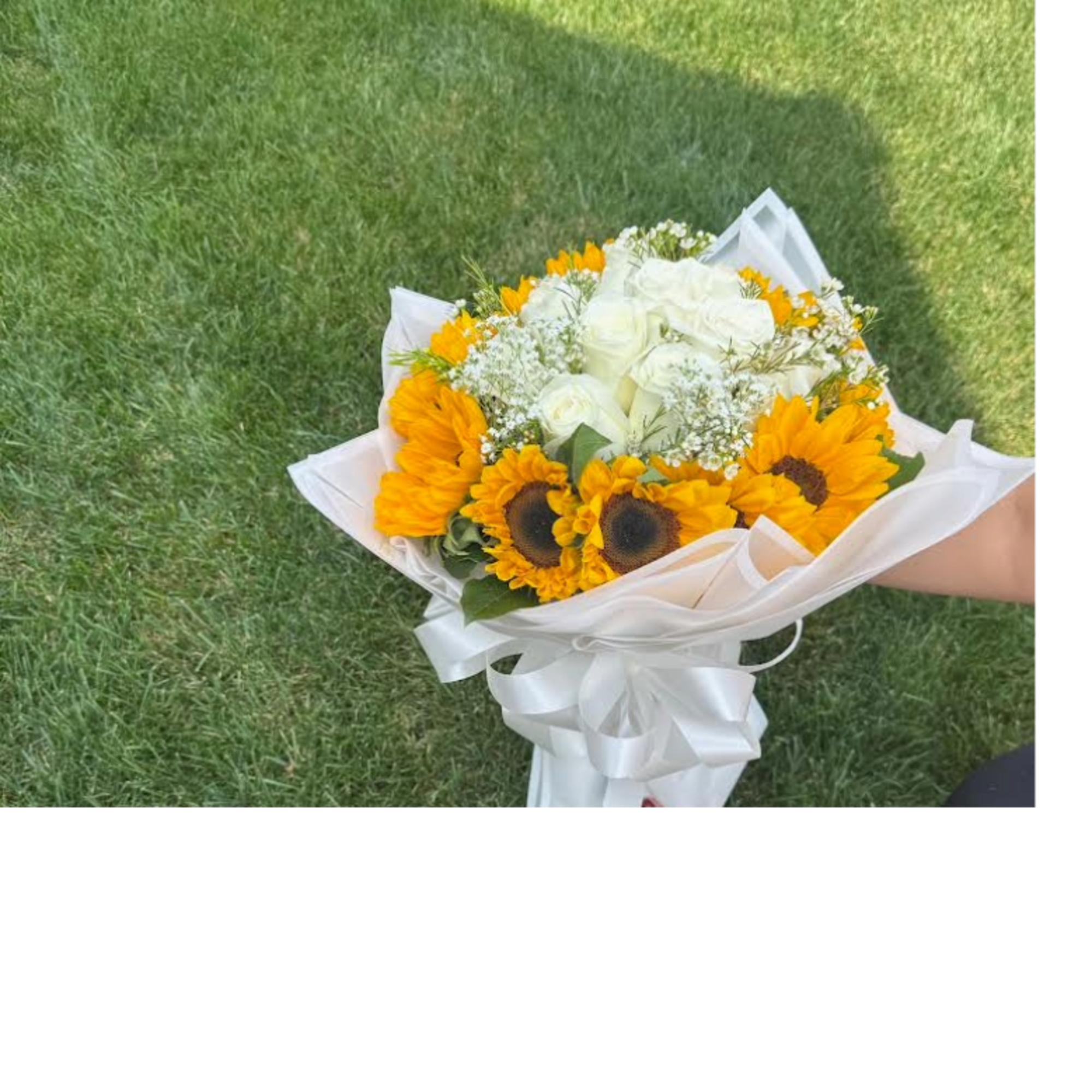 This gorgeous wrapped arrangement includes 12 yellow sunflowers, and 12 white roses