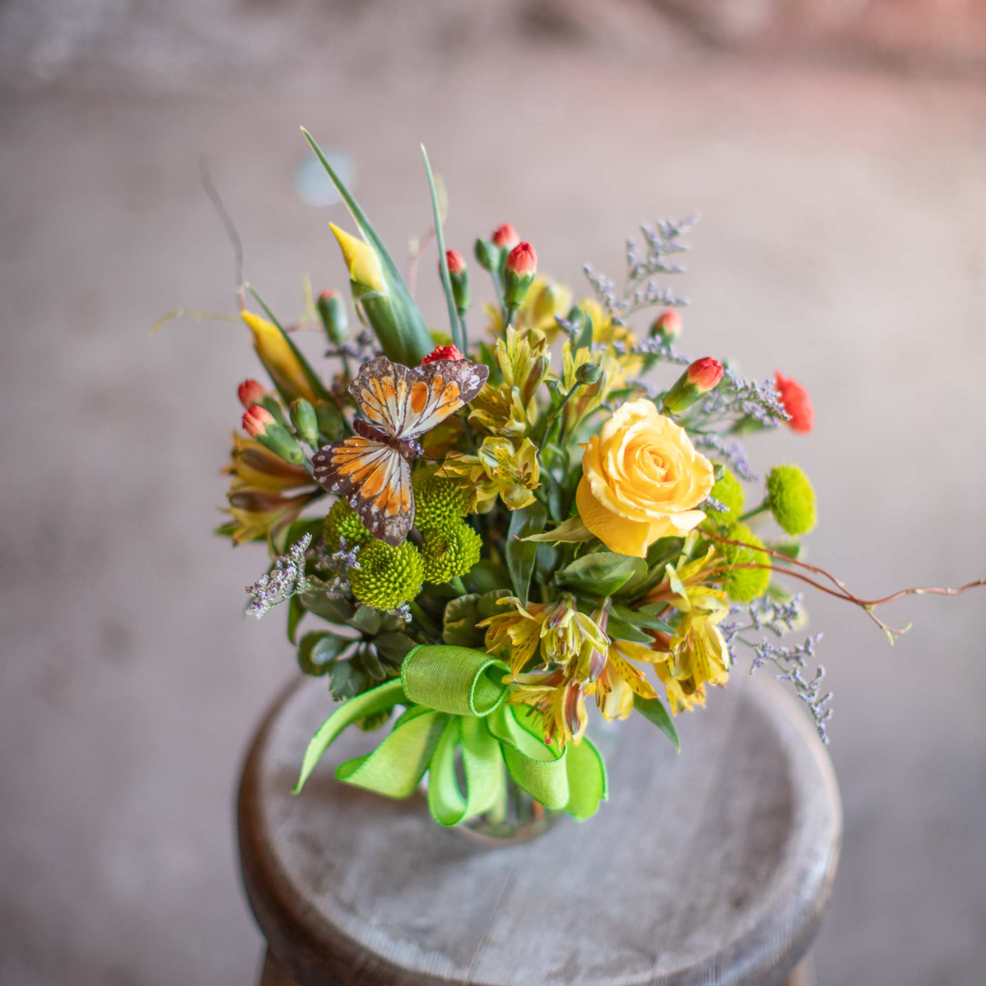 This perky little arrangement is the perfect pick me up! A floral