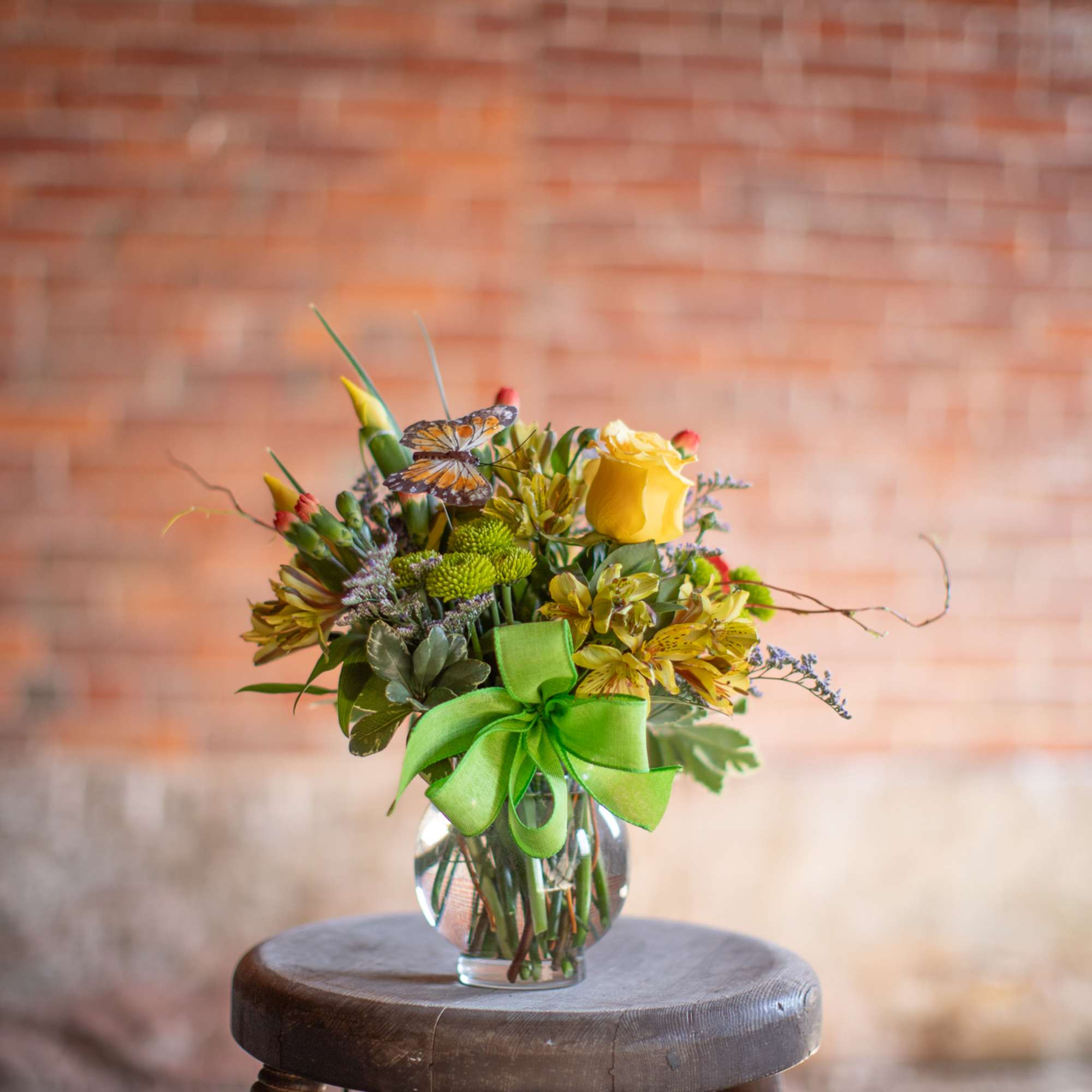 This perky little arrangement is the perfect pick me up! A floral