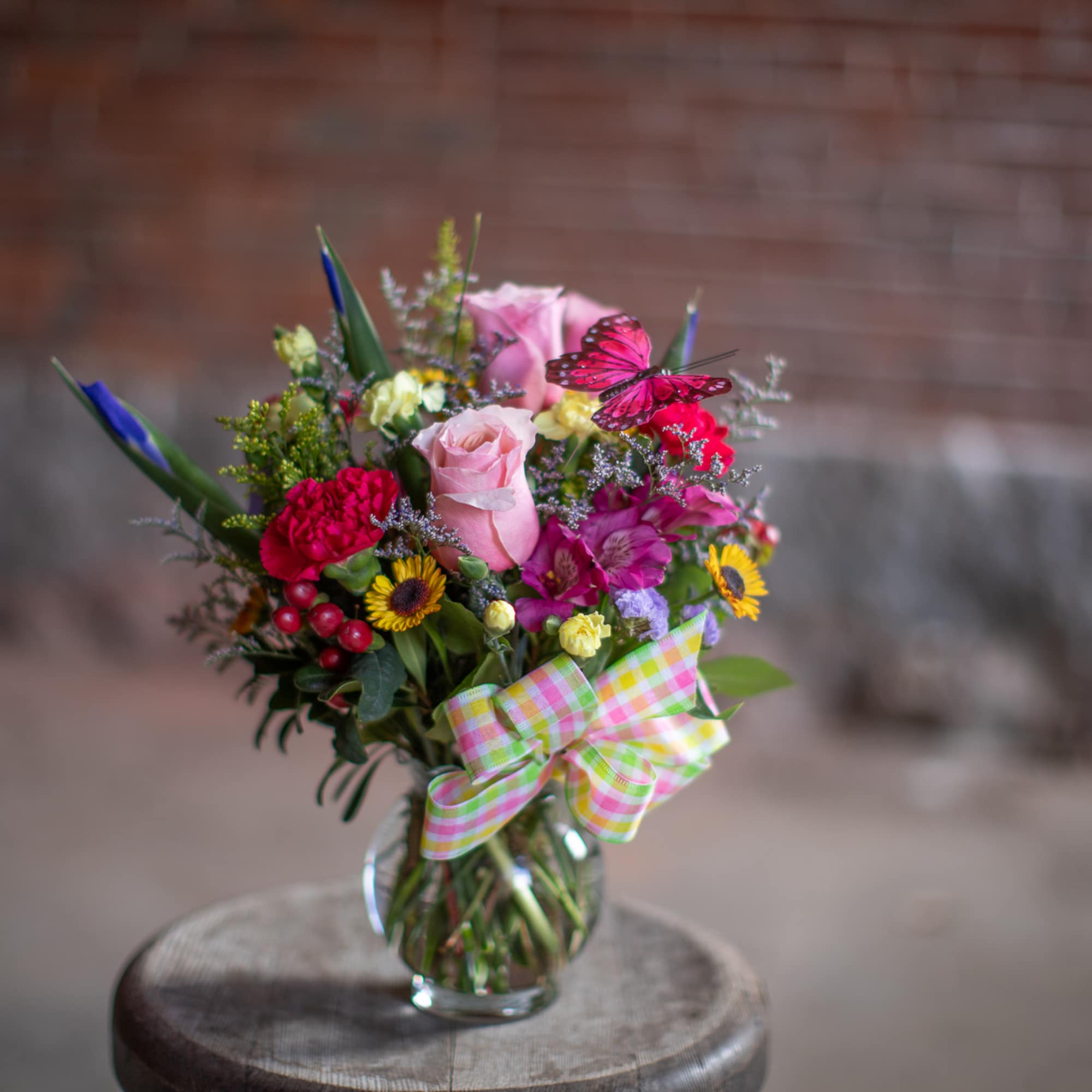 This perky little arrangement is the perfect pick me up! A floral