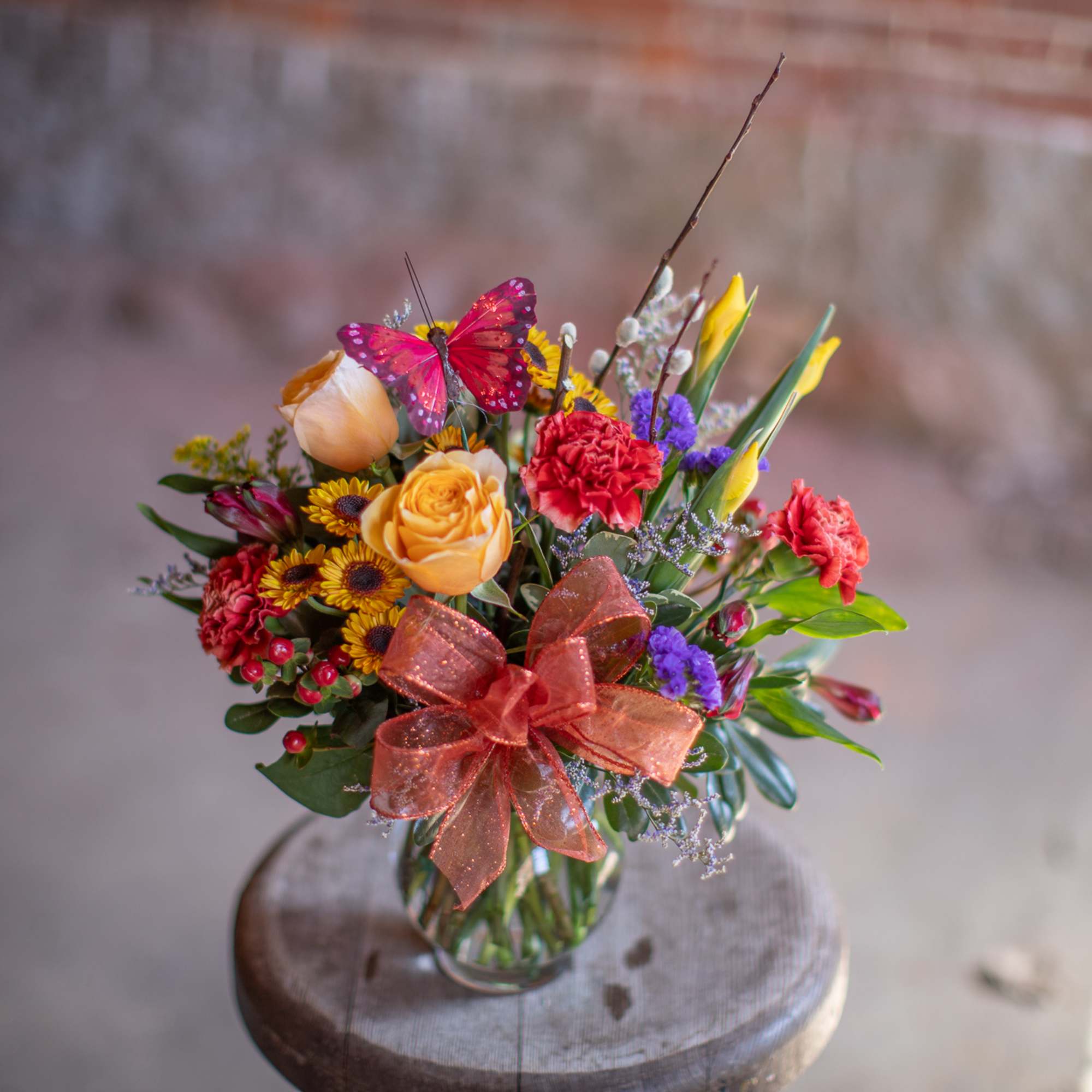 This perky little arrangement is the perfect pick me up! A floral