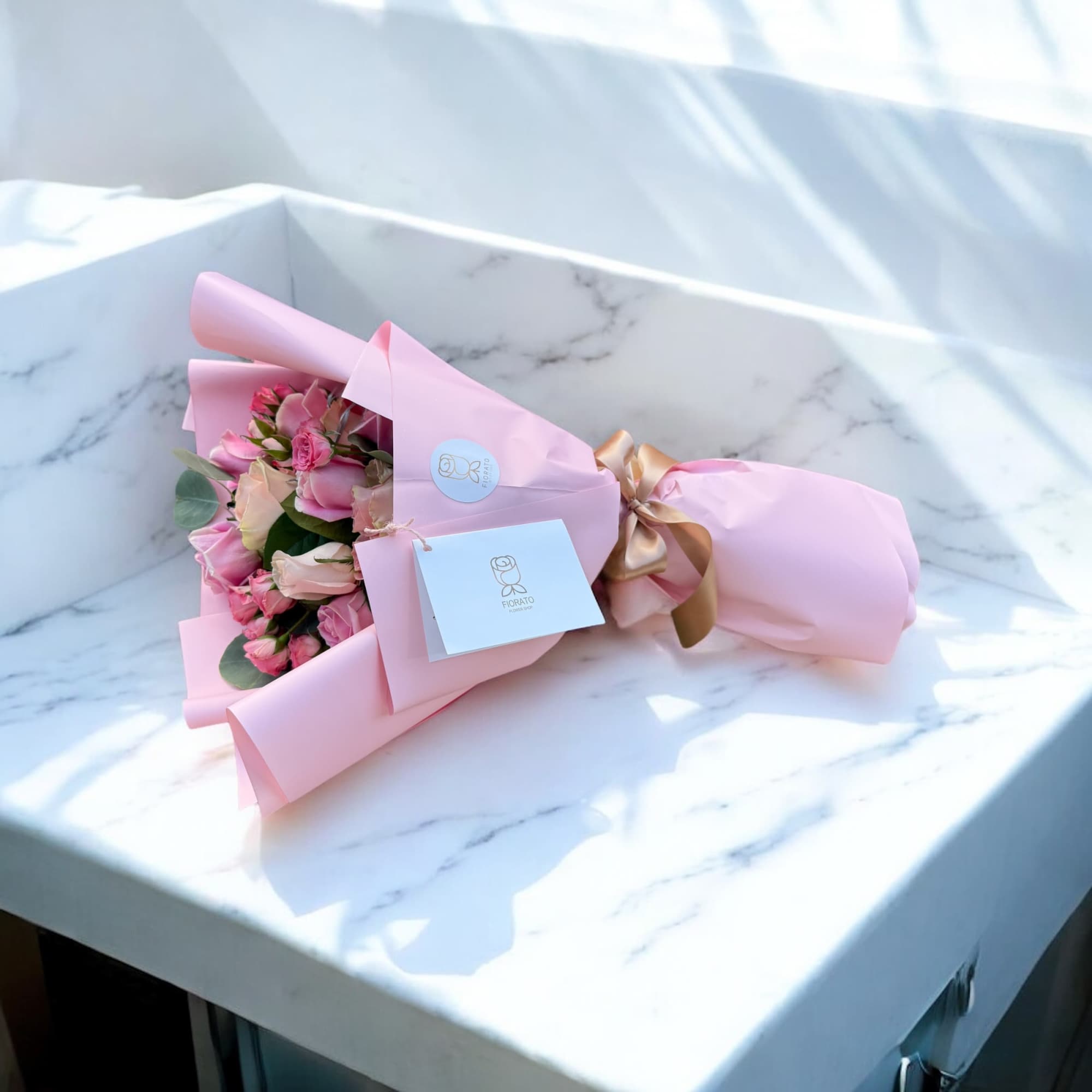 A soft, romantic arrangement in blush and champagne hues. Fresh, elegant, and