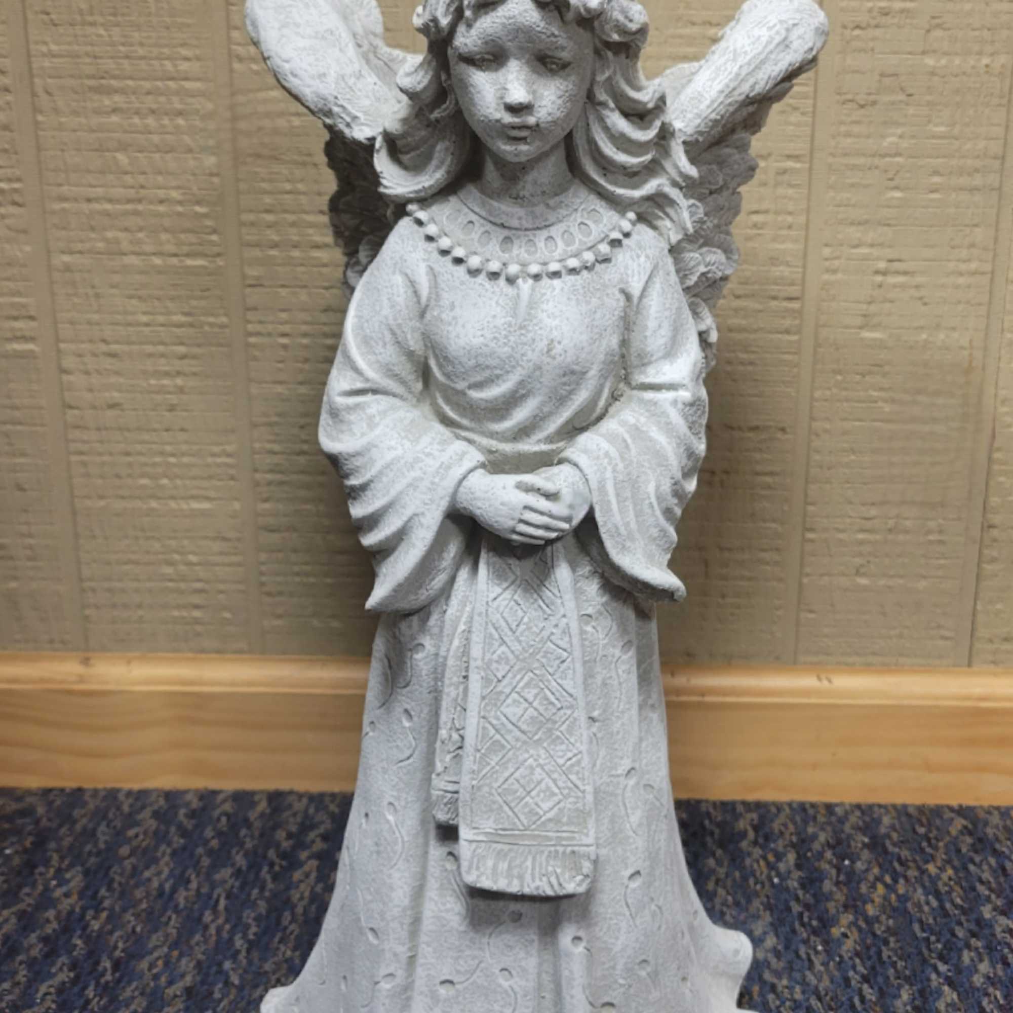 Cement Angel with  planter in the wings.
Approximate Dimensions are 19 1/2