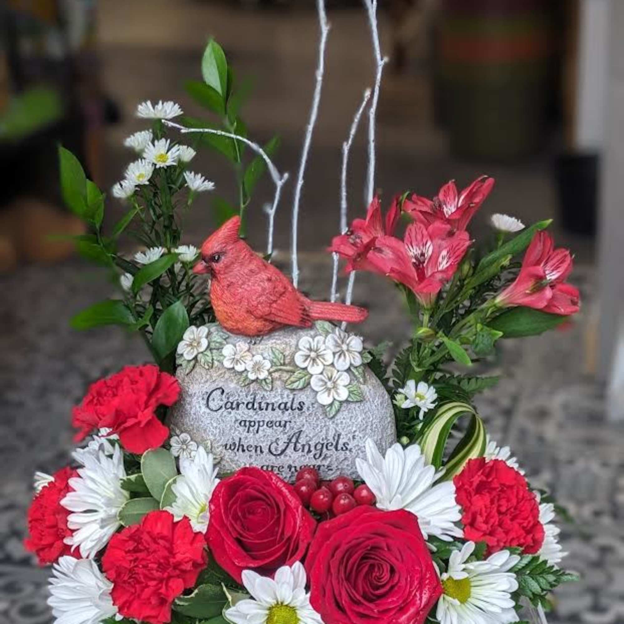 Show them you care with this gorgeous display of roses, daisies, carnations