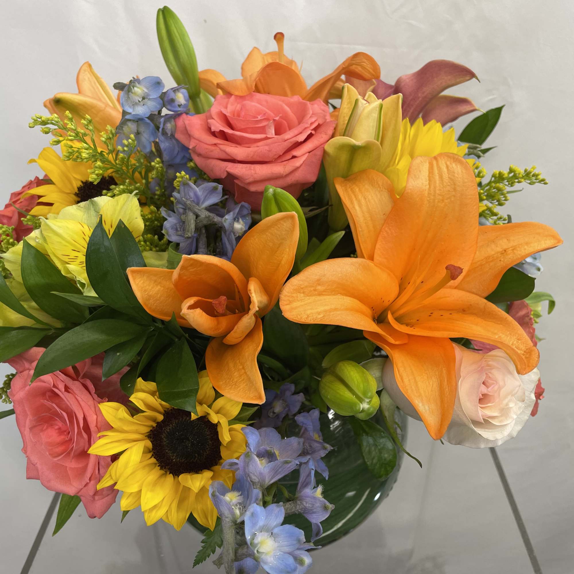 A bright and colorful arrangement is perfect for any occasion! Seasonal sunflowers A bright and colorful arrangement is perfect for any occasion! Seasonal sunflowers
