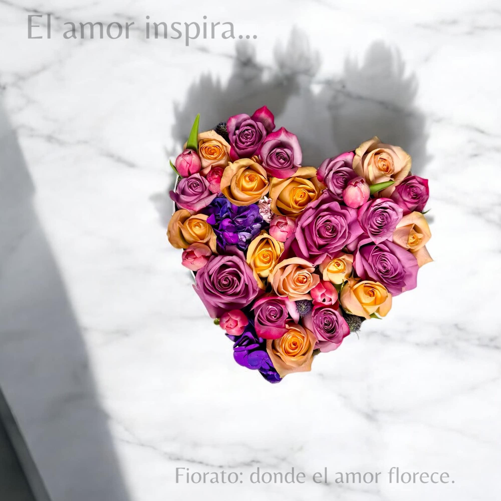 A heart-shaped floral arrangement full of color and feeling. Featuring a mix
