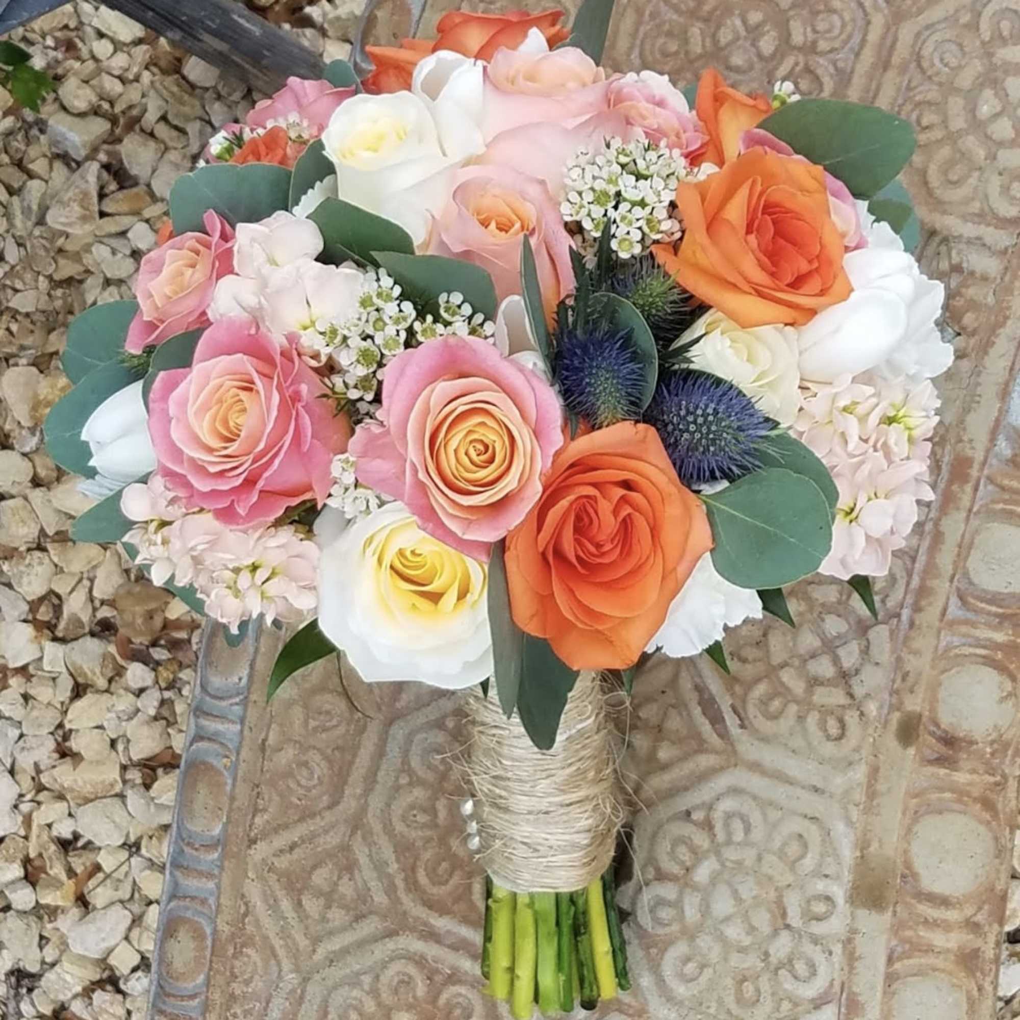 A floral symphony with a harmony of summery flower notes. 
This vibrant